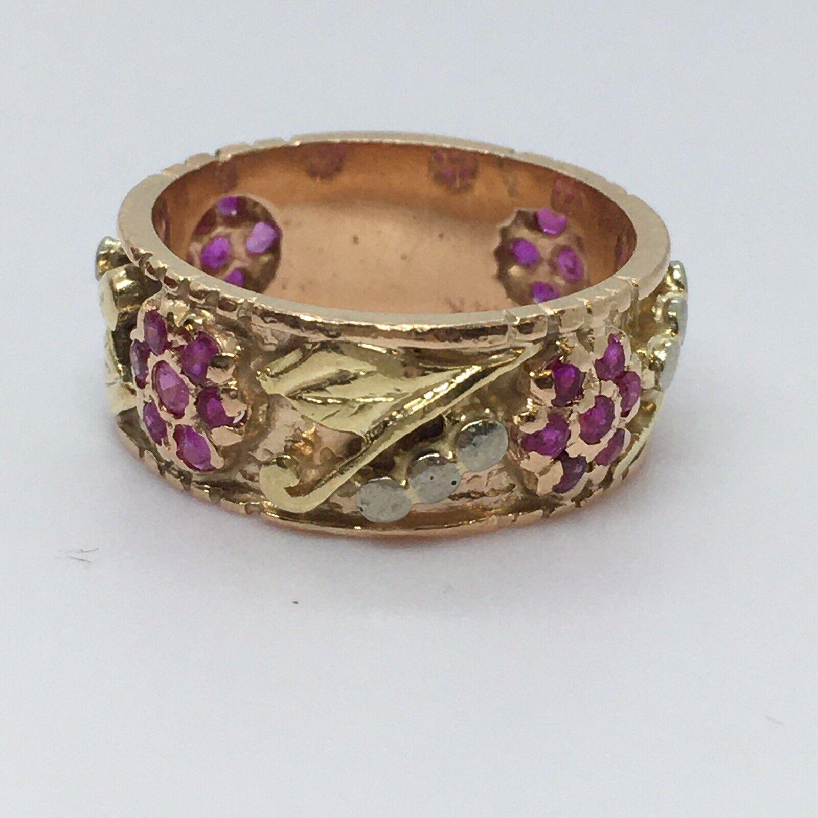 American Antique Art Deco 14k Tricolor Gold Burmese Ruby Band 30s 


Finger size: 6.5
Width: 8mm / .3 inch  
Weight: 5.5 gram 
Country of origin: United States 
Gems: 28 pieces of Old Round Cut natural Burmese Ruby
Condition: pre-owned, stones have