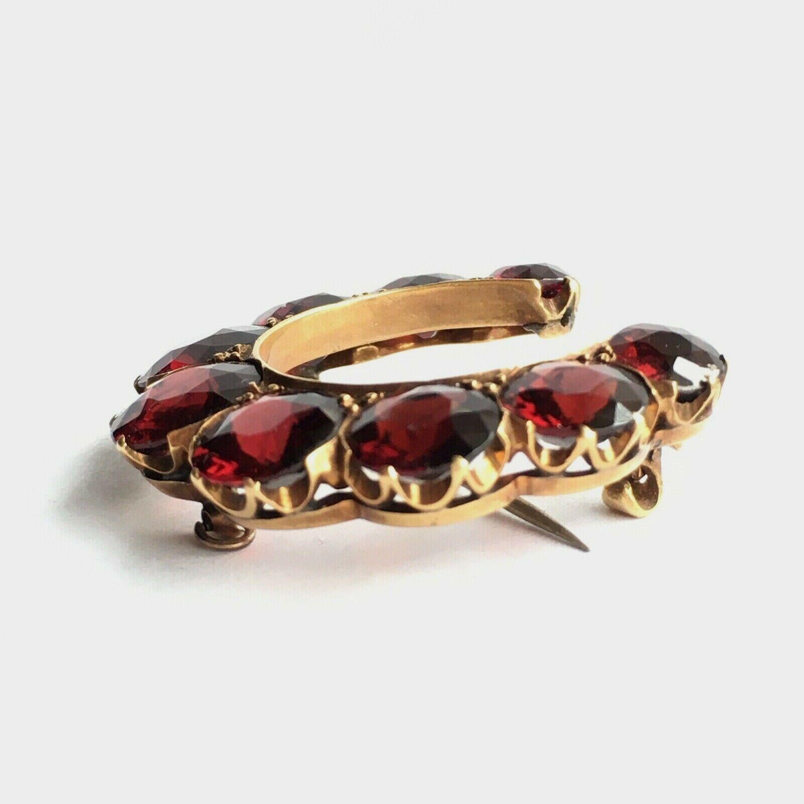 American Antique Edwardian/ post Gilded Age 14K Rosi Yellow Gold Brooch circa 1900s, nine pieces of Old European Cut Natural Pyrope Garnet 6.5 mm to 9 mm in excellent condition considering 100 Yrs of age, approximate size of 1 1/4 inch by 1 3/4