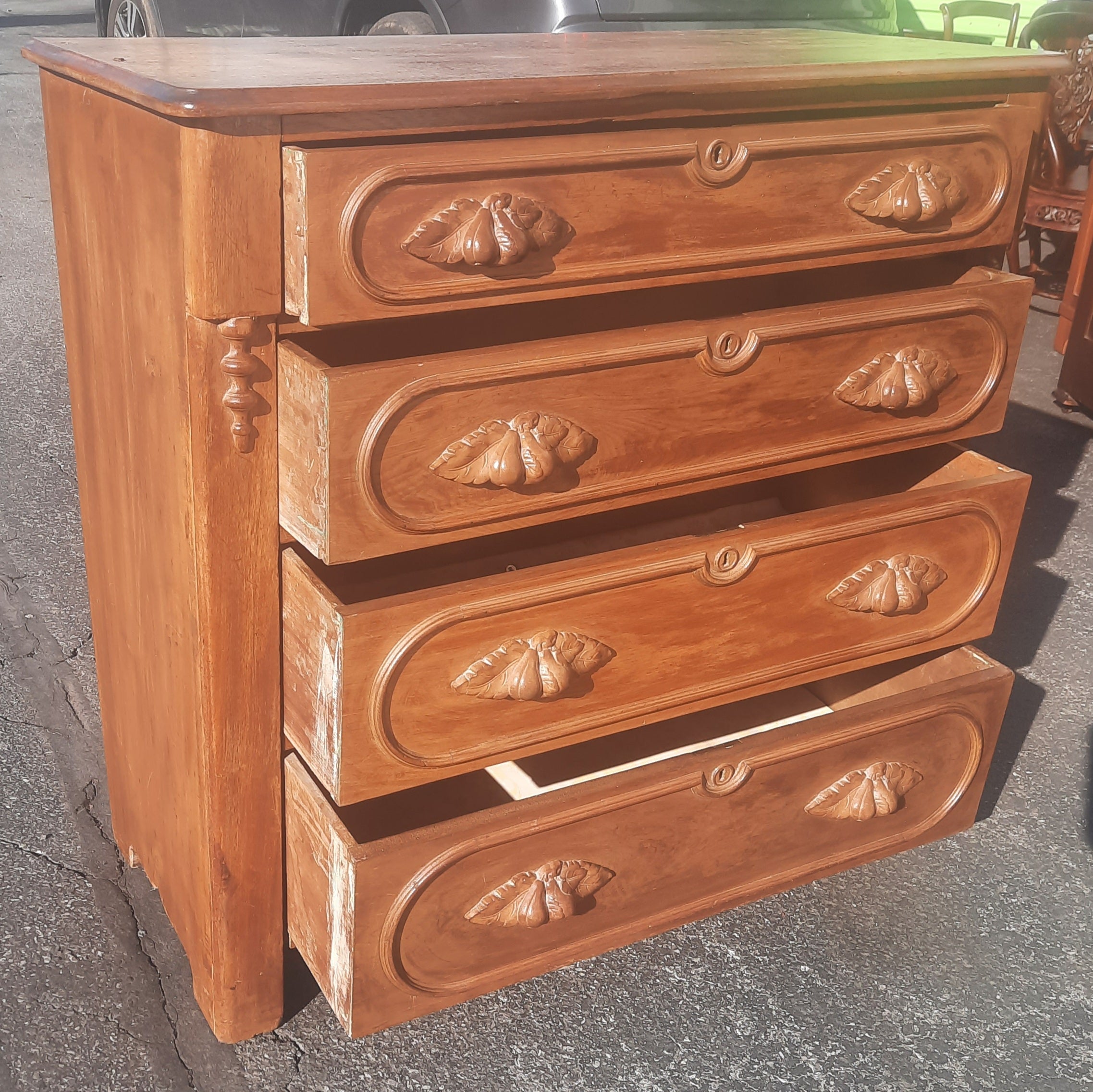 Fabulous American antique chest of drawers / dresser.
Space saving design and with ample storage options.
 Hand carved wood pulls. Solid walnut wood frame that is a perfect size for any space.
Overall good vintage condition and extremely sturdy.