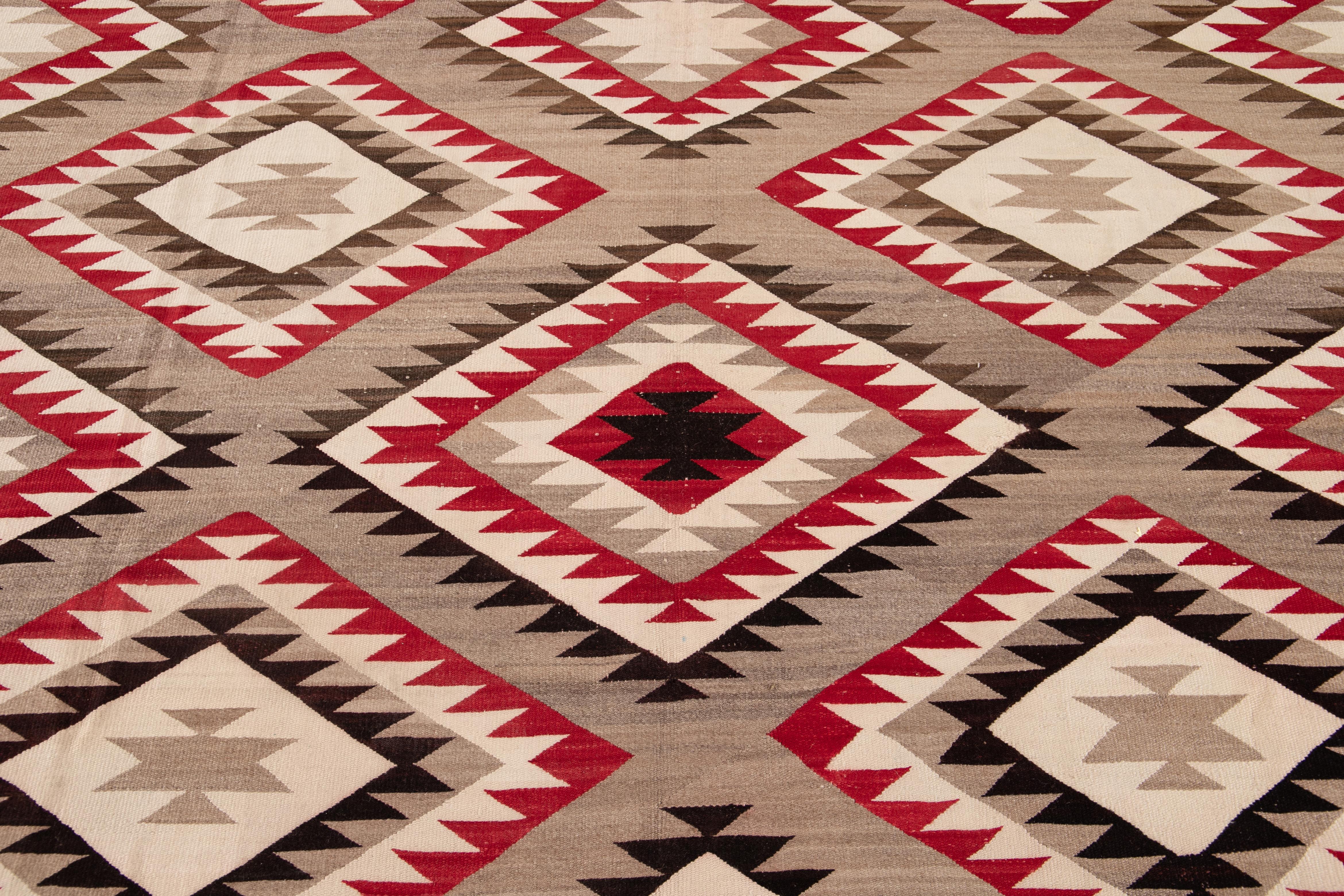 American Antique Navajo Geometric Folk Navajo Flat-Weave Wool Rug For Sale 6