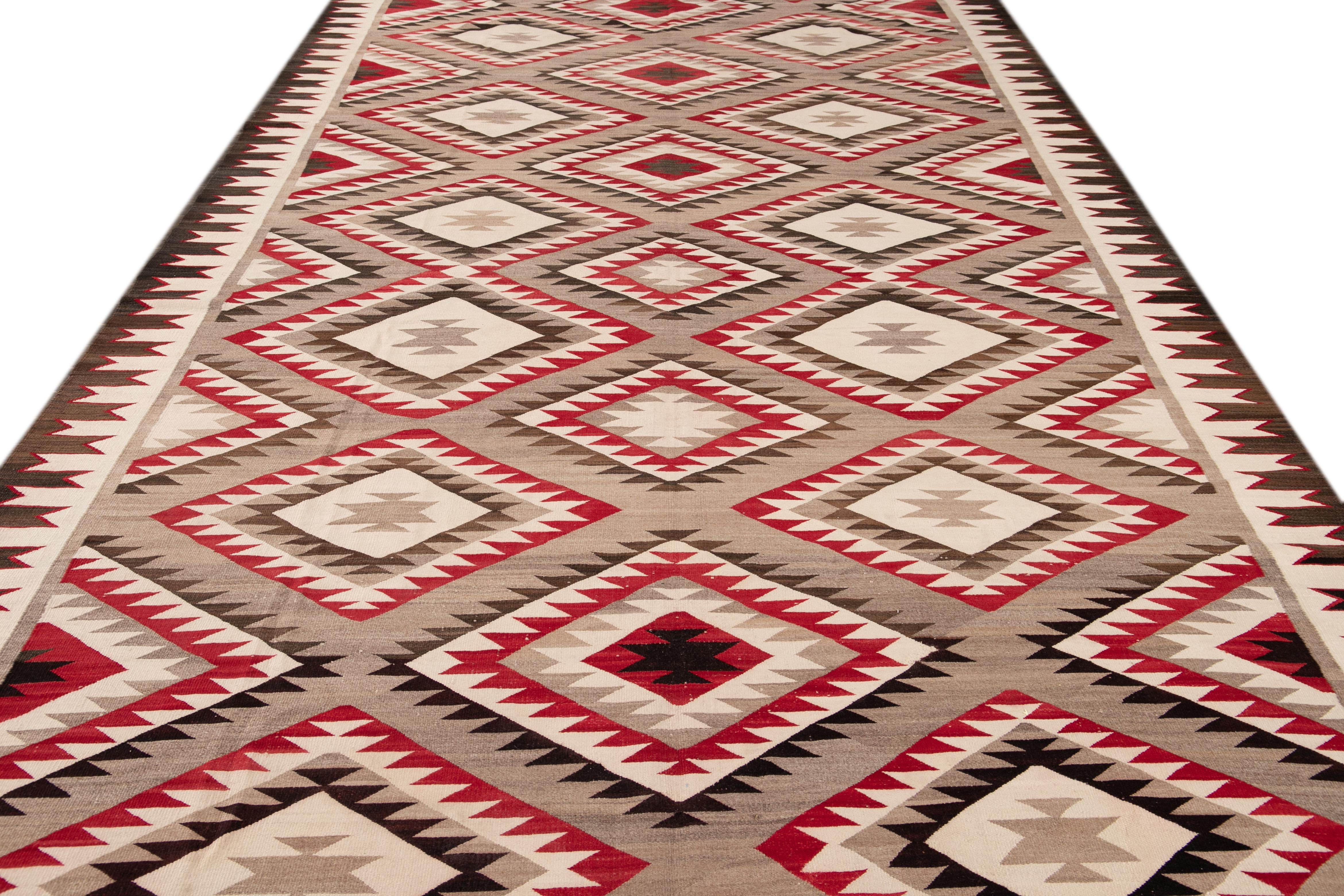 Hand-Woven American Antique Navajo Geometric Folk Navajo Flat-Weave Wool Rug For Sale