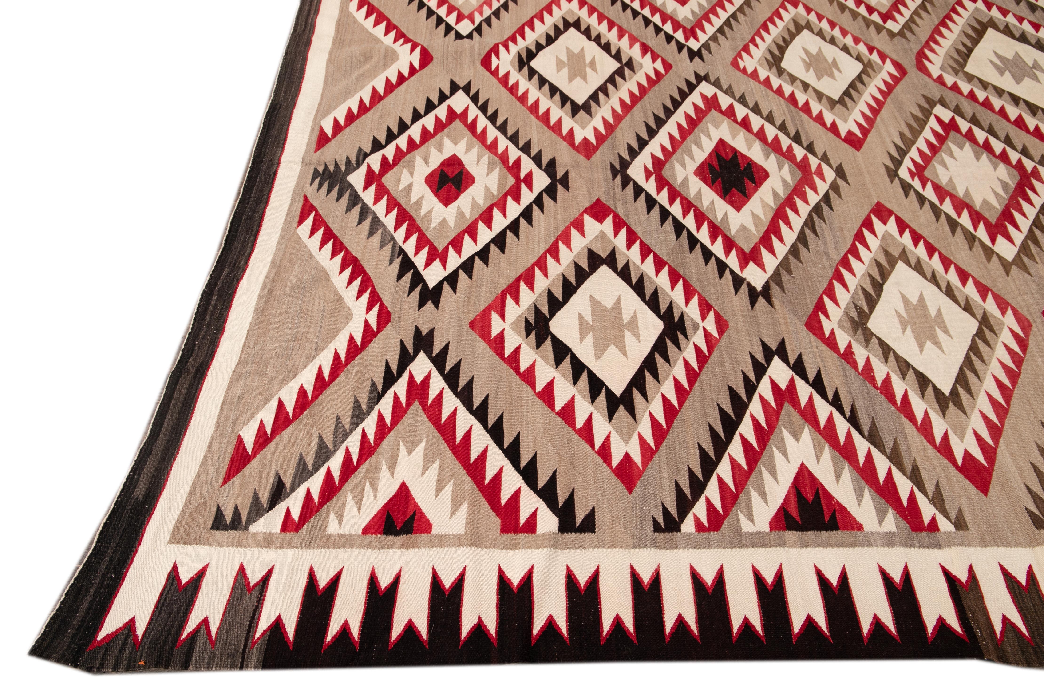 American Antique Navajo Geometric Folk Navajo Flat-Weave Wool Rug In Excellent Condition For Sale In Norwalk, CT