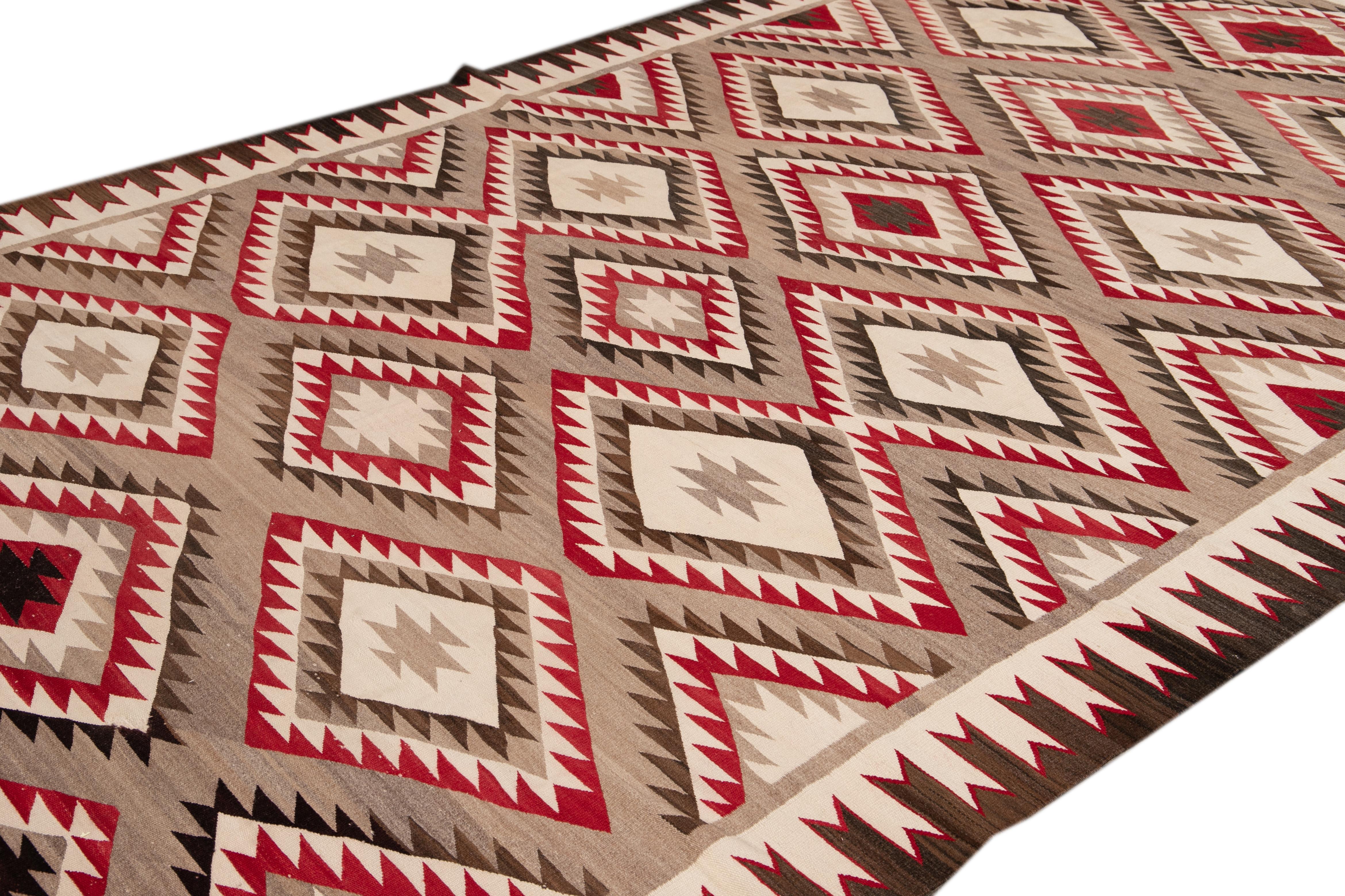 American Antique Navajo Geometric Folk Navajo Flat-Weave Wool Rug For Sale 1