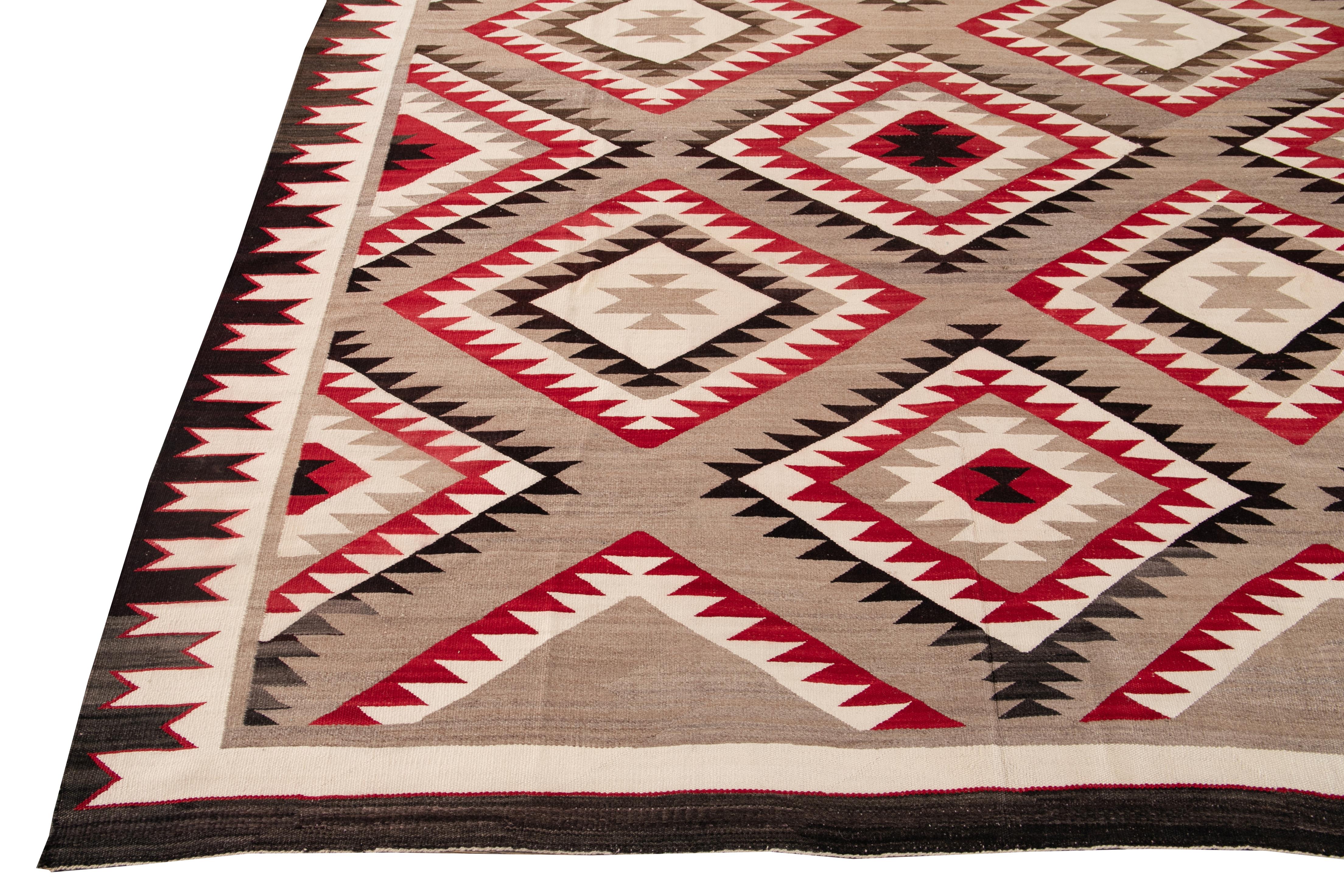 American Antique Navajo Geometric Folk Navajo Flat-Weave Wool Rug For Sale 4