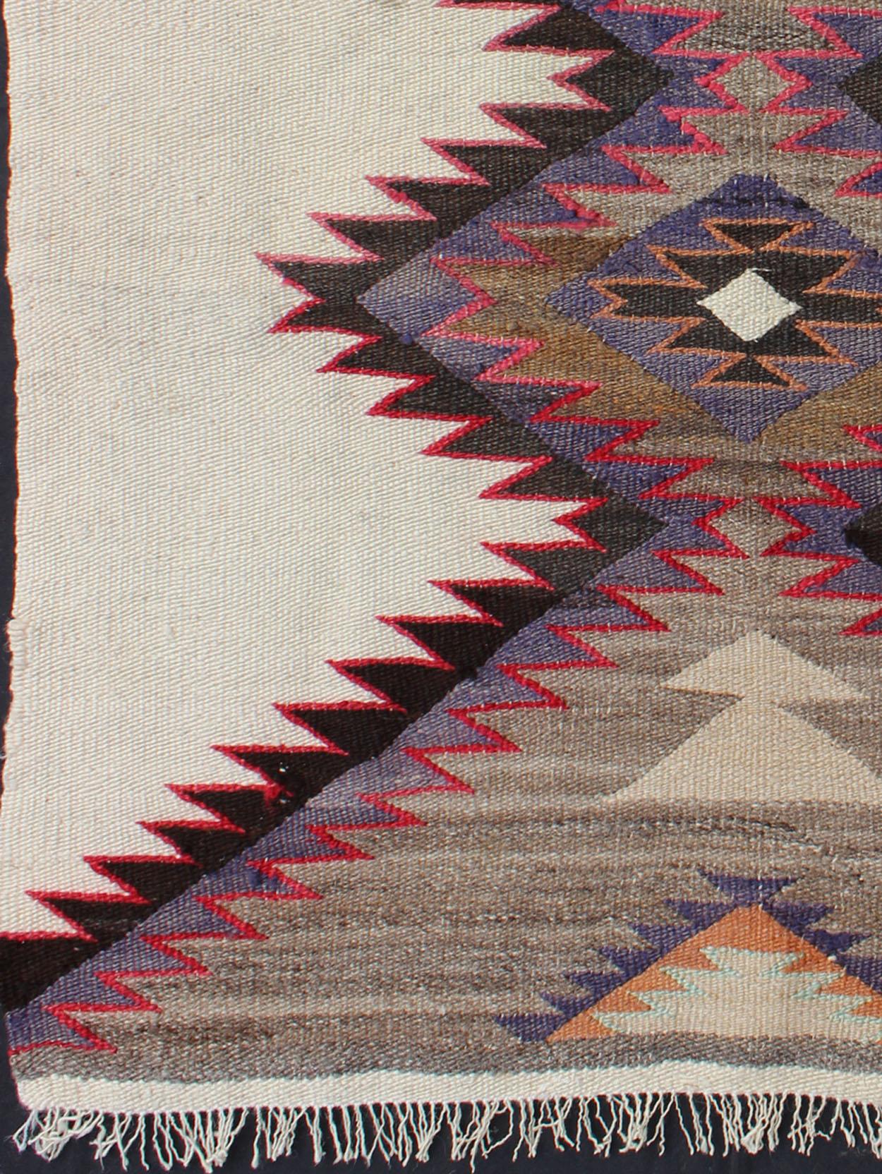 Hand-Woven American Antique Navajo Rug Geometric Design in Ivory, Red, Black and Lavender
