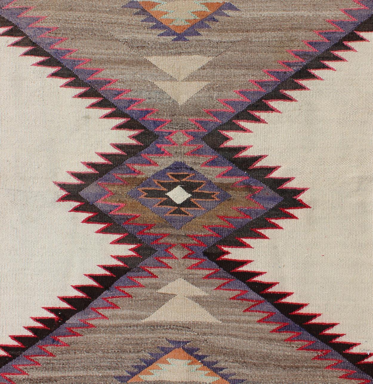 American Antique Navajo Rug Geometric Design in Ivory, Red, Black and Lavender In Good Condition In Atlanta, GA