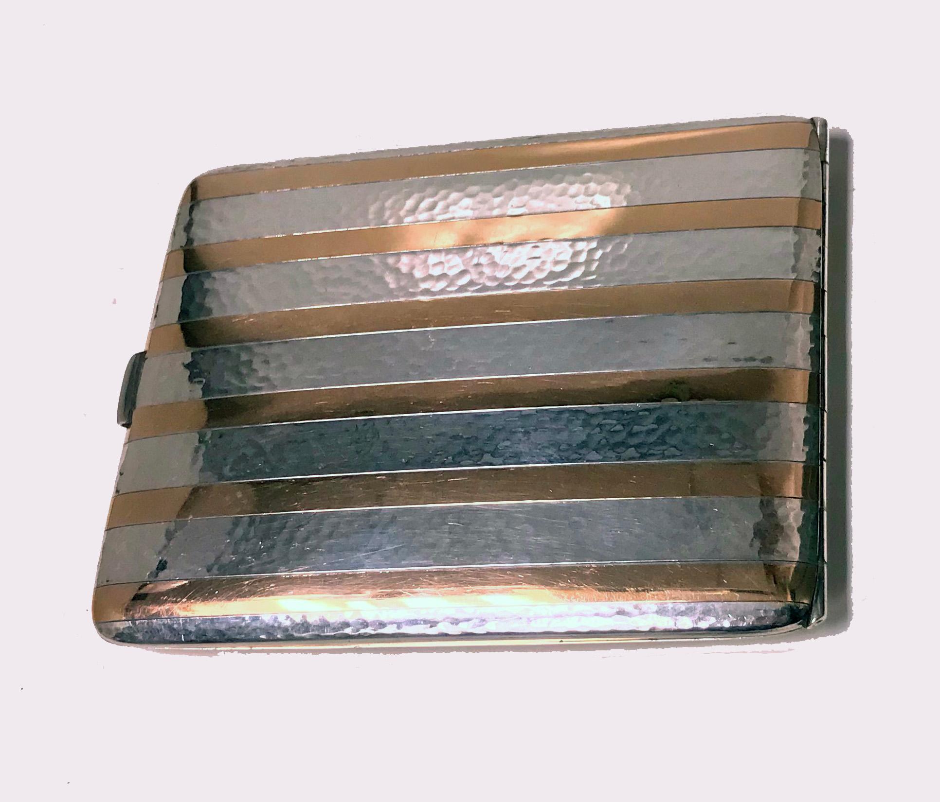 American Art Deco 14-karat and sterling silver cigarette case, Watrous Mfg Silver Co mark for CW Wallingford, CT and numbered 168. Rectangular slightly concave form hammered panels of sterling interspace with 14-karat pink gold inlaid bands.