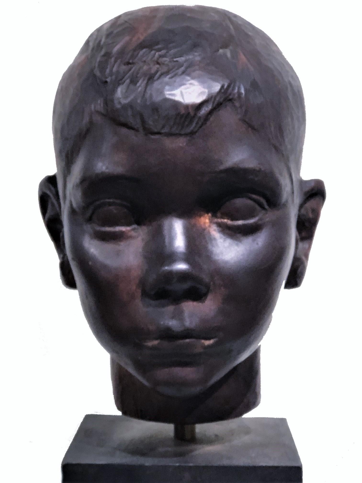 ABOUT SCULPTURE
This wonderful sculptural and portrait work was certainly created by a master sculptor, although not signed by the author. The face of this typical all-American boy, as if familiar to everyone, is distinguished by a special emotional