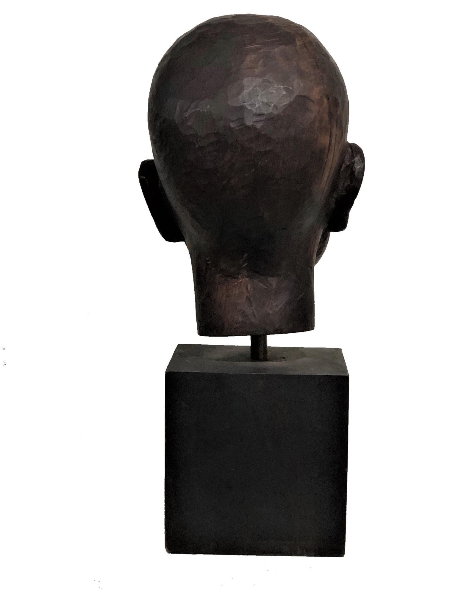American Art Deco Carved Ebonized Wood Head Bust of a Young Boy, ca. 1940s For Sale 1