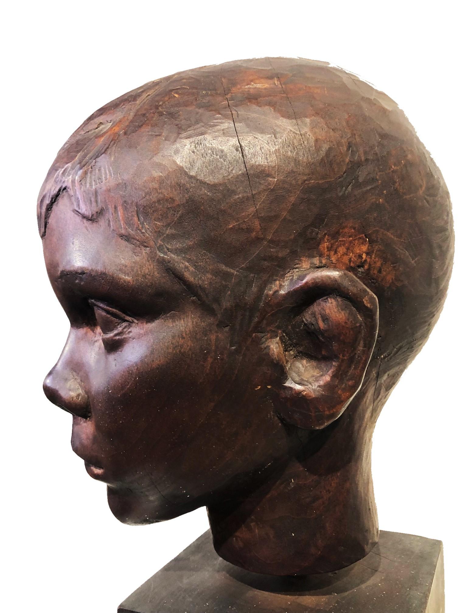 American Art Deco Carved Ebonized Wood Head Bust of a Young Boy, ca. 1940s For Sale 3