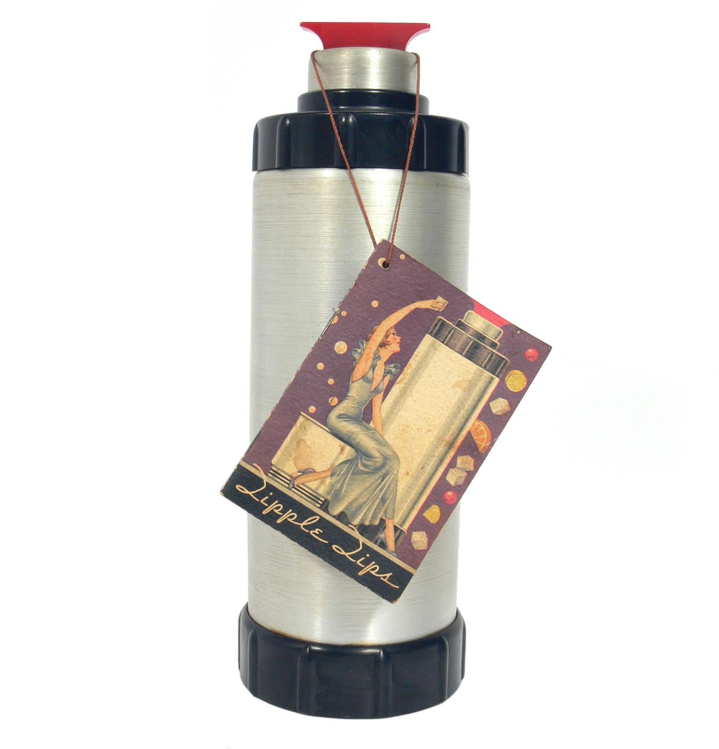 American Art Deco cocktail shaker, designed by Ralph Kirchler for West bend aluminium company, circa 1930s. Beautiful Art Deco design in spun aluminium and red Bakelite. It comes with it's original hang tag booklet, entitled 