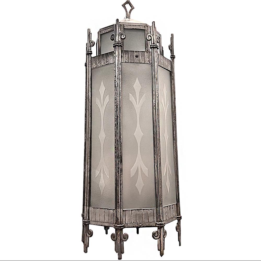 A circa 1930's silver art deco lantern with original glass insets and patina.

Measurements:
Height of body: 38.25