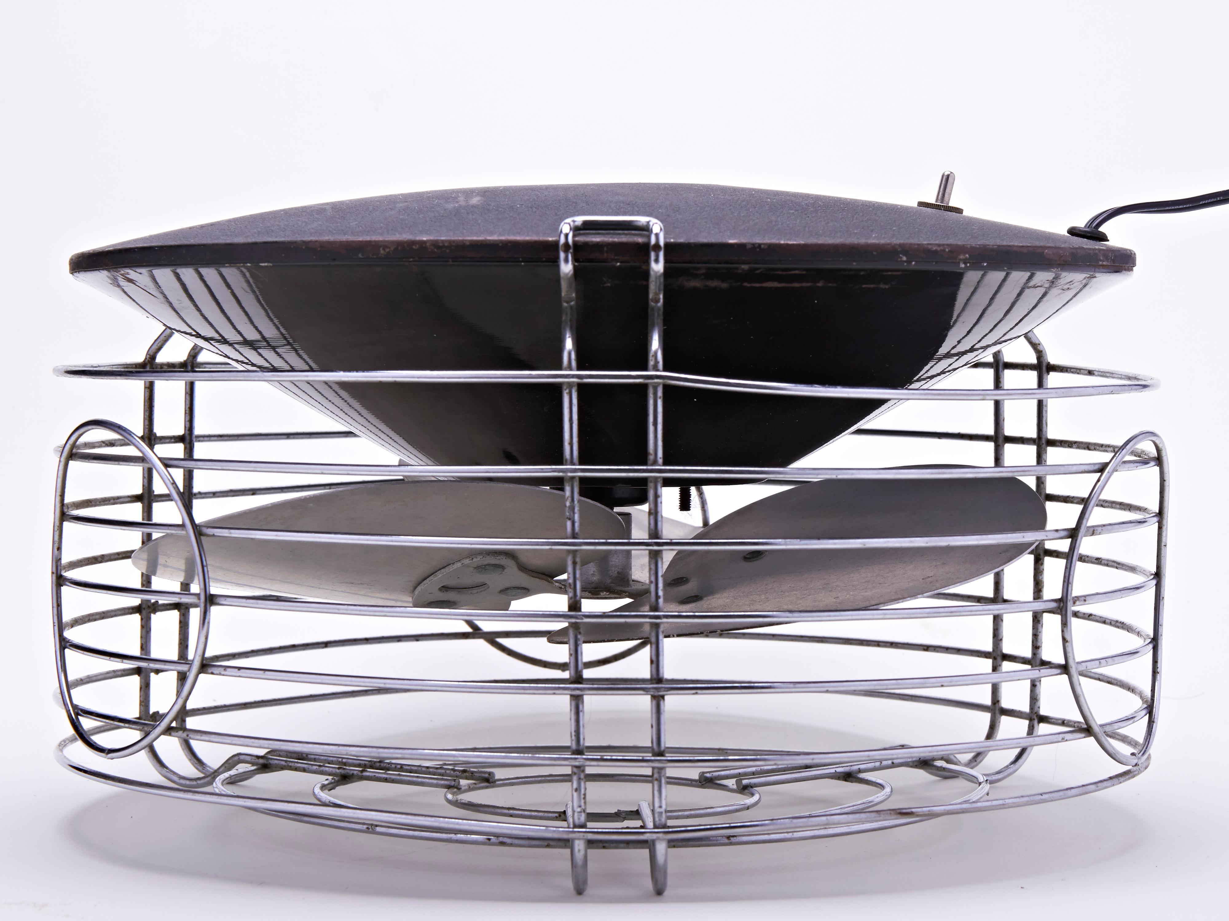 This stunningly designed American Art Deco/Machine Age Command-Air lateral floor fan is sometimes confused with a hassock fan. However this was not designed to sit on or put one's feet on, but created by the Warren Engineering Corporation of Chicago