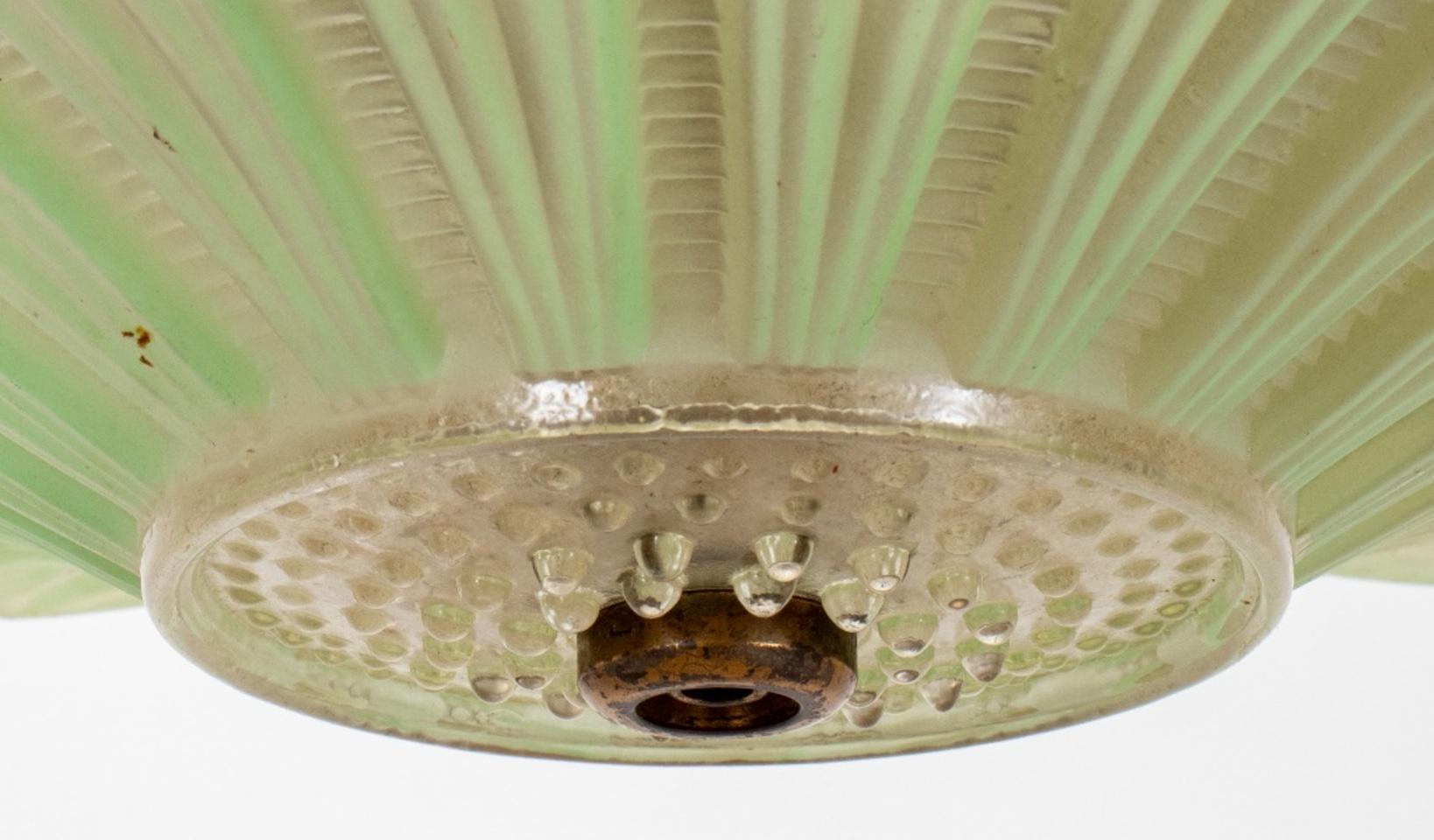 American Art Deco period molded glass pendant light, with pressed glass fountain plume and basin detail above a reeded column, supporting a five light pendant with pressed frosted glass shade with abstracted floral detail.

Dimensions: 14