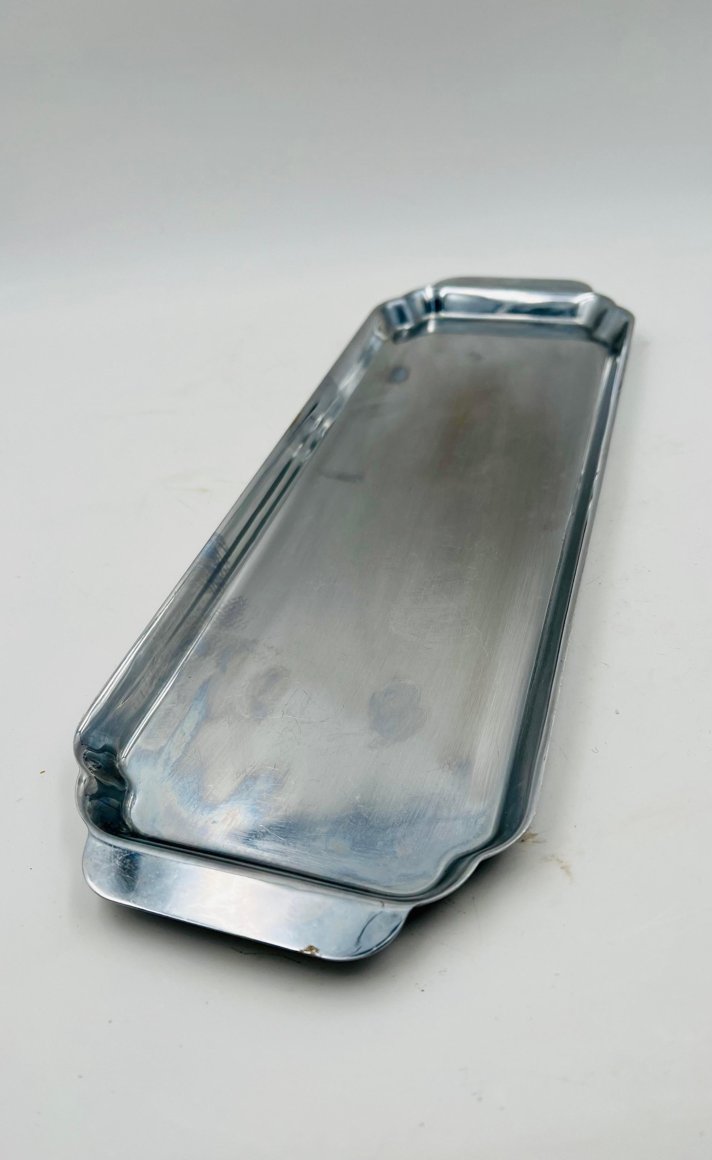 Beautiful and rare chrome plated art deco tray by Chase some light wear on the center stamped at the bottom.