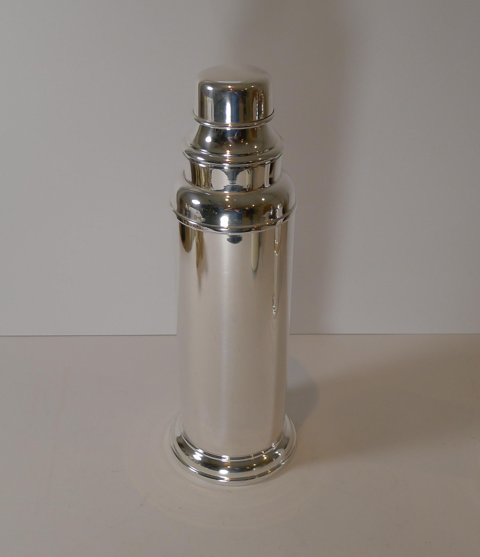 A stunning tall silver plated cocktail shaker made by the Sheffield Silver Co., Brooklyn, New York in c.1940; fully marked on the underside.

Just back from our silversmith's workshop where it has been professionally cleaned and polished,