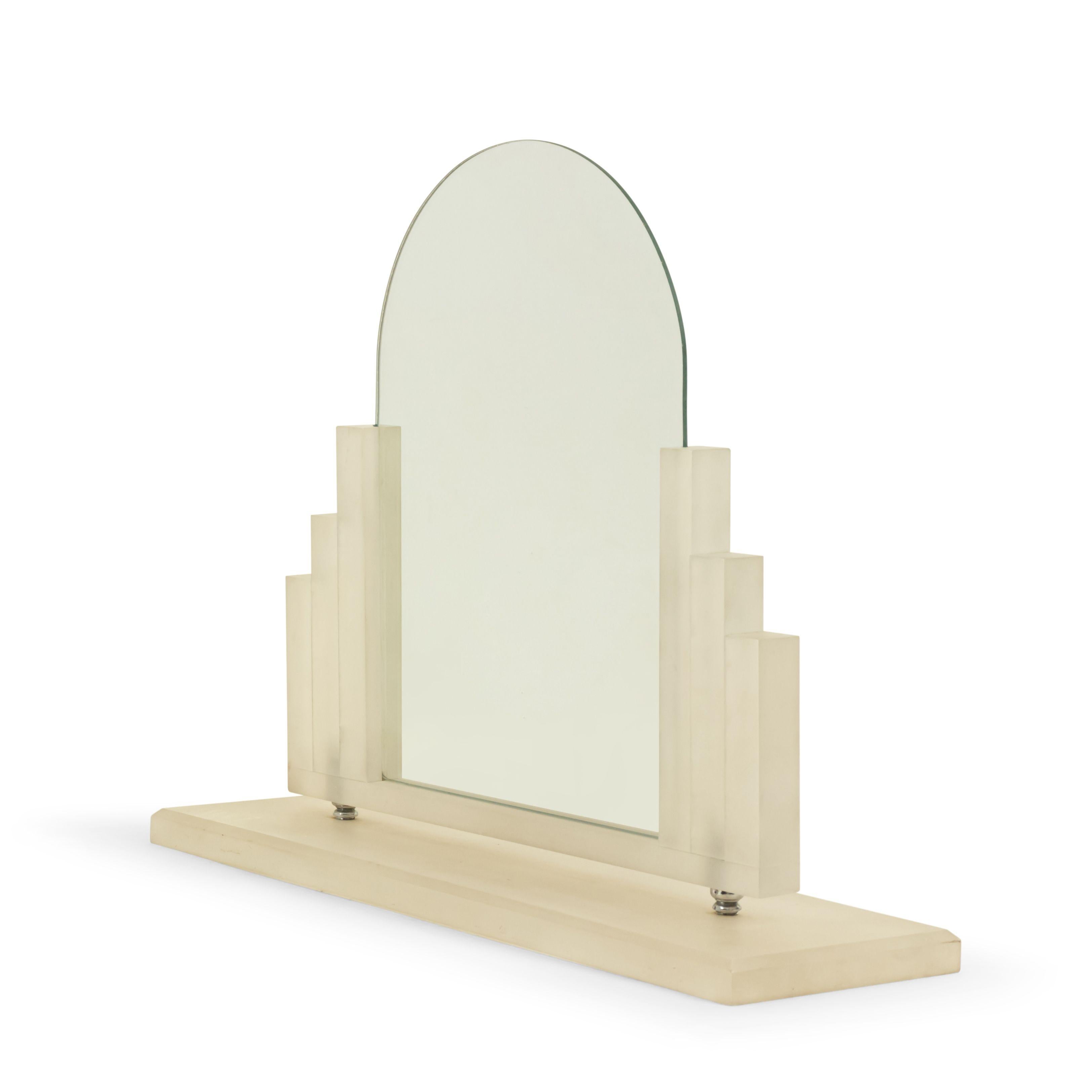 American Art Deco style frosted lucite dressing table / vanity mirror with tiered sides supporting an arch top mirror.
 