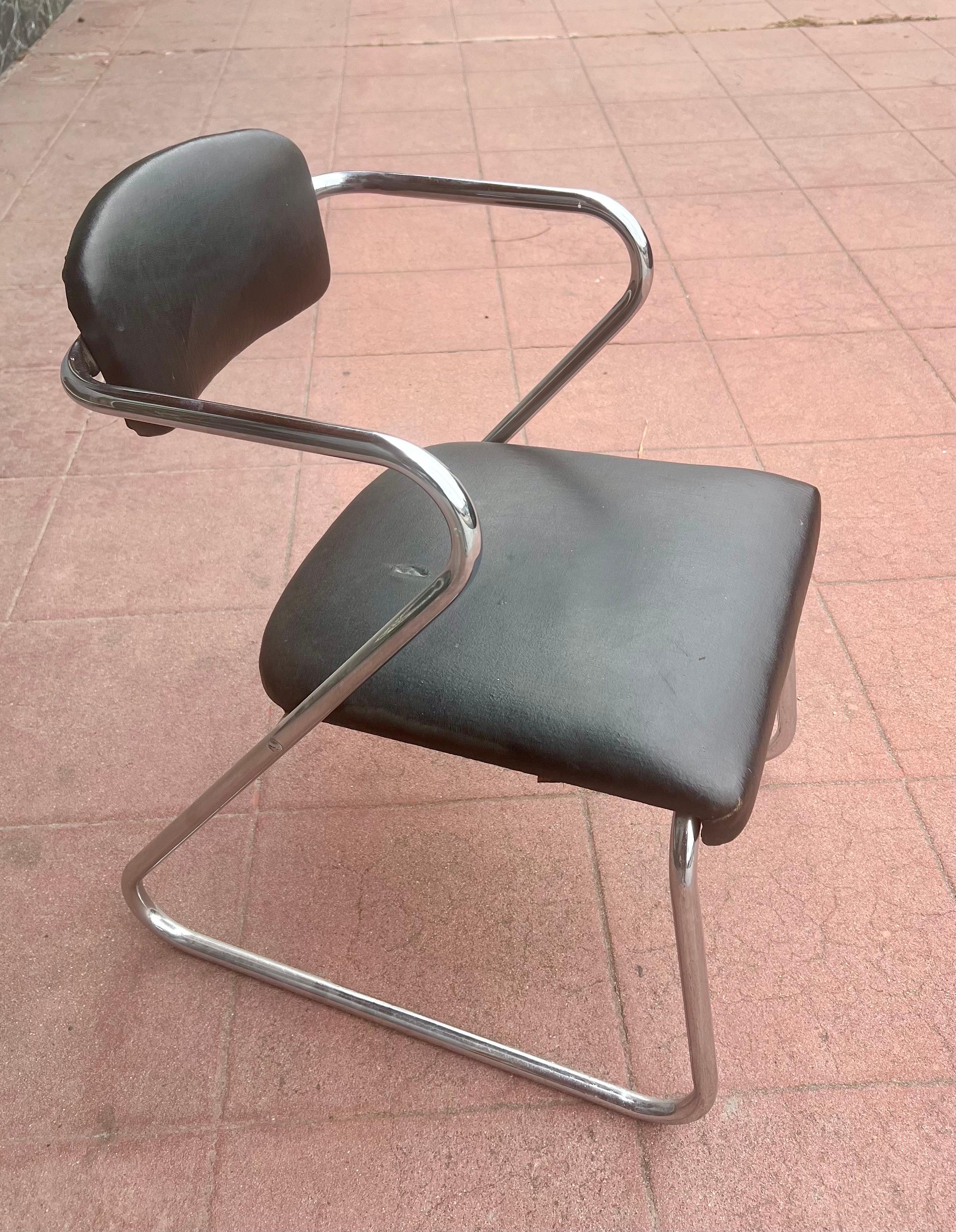 Modernist Chrome Cantilever Chair by Etowah Mfg, Bauhaus / Art Deco, Super stylized Amazing original condition. Extremely comfortable. Superior quality and construction.Designed by Gilbert Rohde. Nice original finish and condition upholstered in