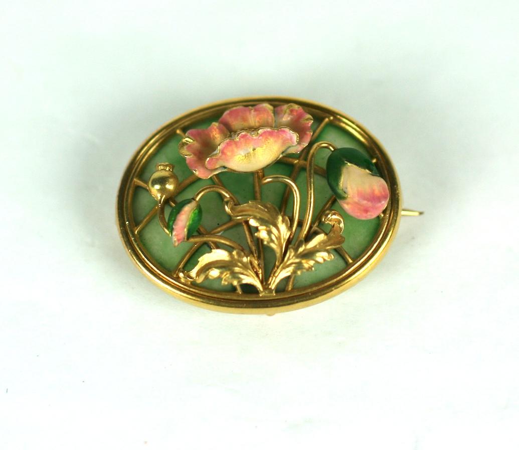 Wonderful American Art Nouveau 14k Plique a Jour Brooch of enameled poppies on a pale green plique a jour ground. Flowers modeled in high relief with pink and green translucent enamels. Original hook as well for watch. 
Made in Newark NJ, during the