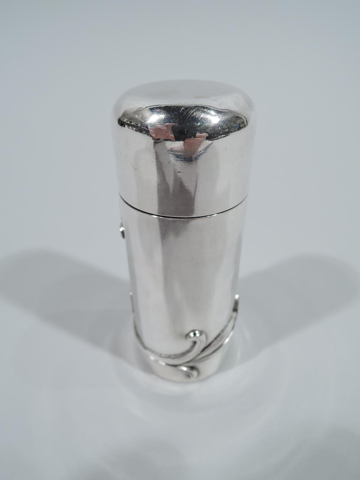 Turn-of-the-century Art Nouveau sterling silver vanity box. Made by William B. Kerr in Newark. Cylindrical with snug-fitting cover. Flower with fluid and whiplash wraparound stem applied to body. Fully marked and numbered 1379. Weight: 2 troy ounces.