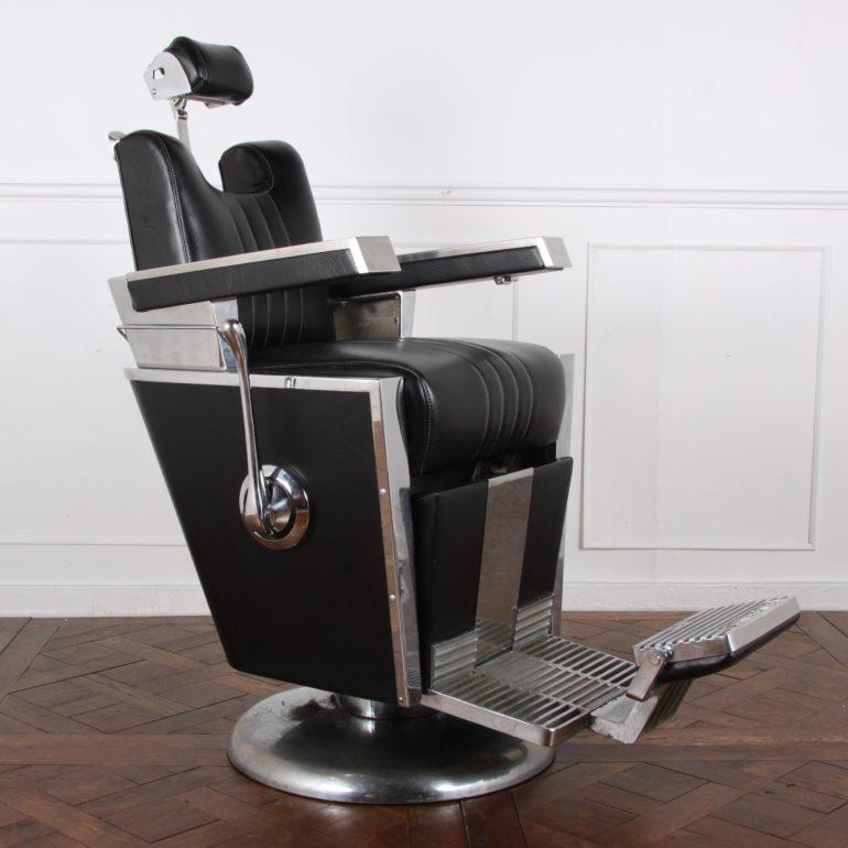 A mid-century barber’s chair made by the Emil J. Paidar Company of Chicago, in 1960.

Spins, raises by means of a hydraulic pump, and reclines. Crca 1960.

43 inches Wide x 30 inches Deep x 46 inches Tall (upright position) x 31 inches
