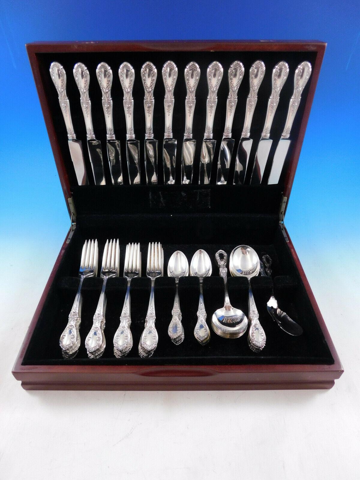 Dinner size American beauty by Manchester sterling silver flatware set - 62 pieces. This set includes:

12 dinner size knives, 9 1/2