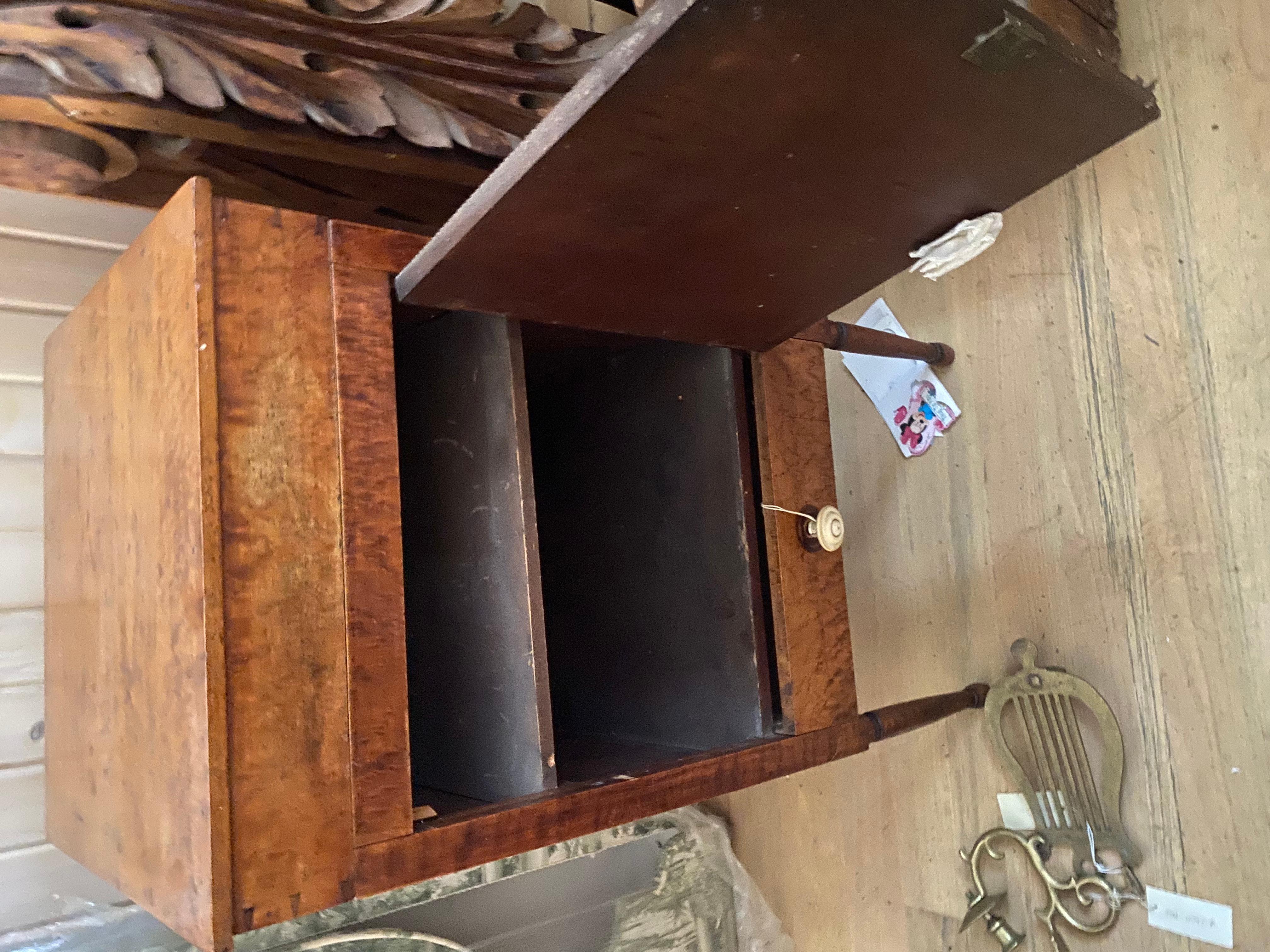 Very clean and sculptural American bird's-eye maple cabinet finished on all four sides with bone handle, early 19th century.
