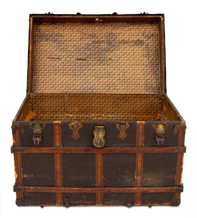 American Brass Mounted and Canvas Covered Wood Steamer Trunk, marked 
