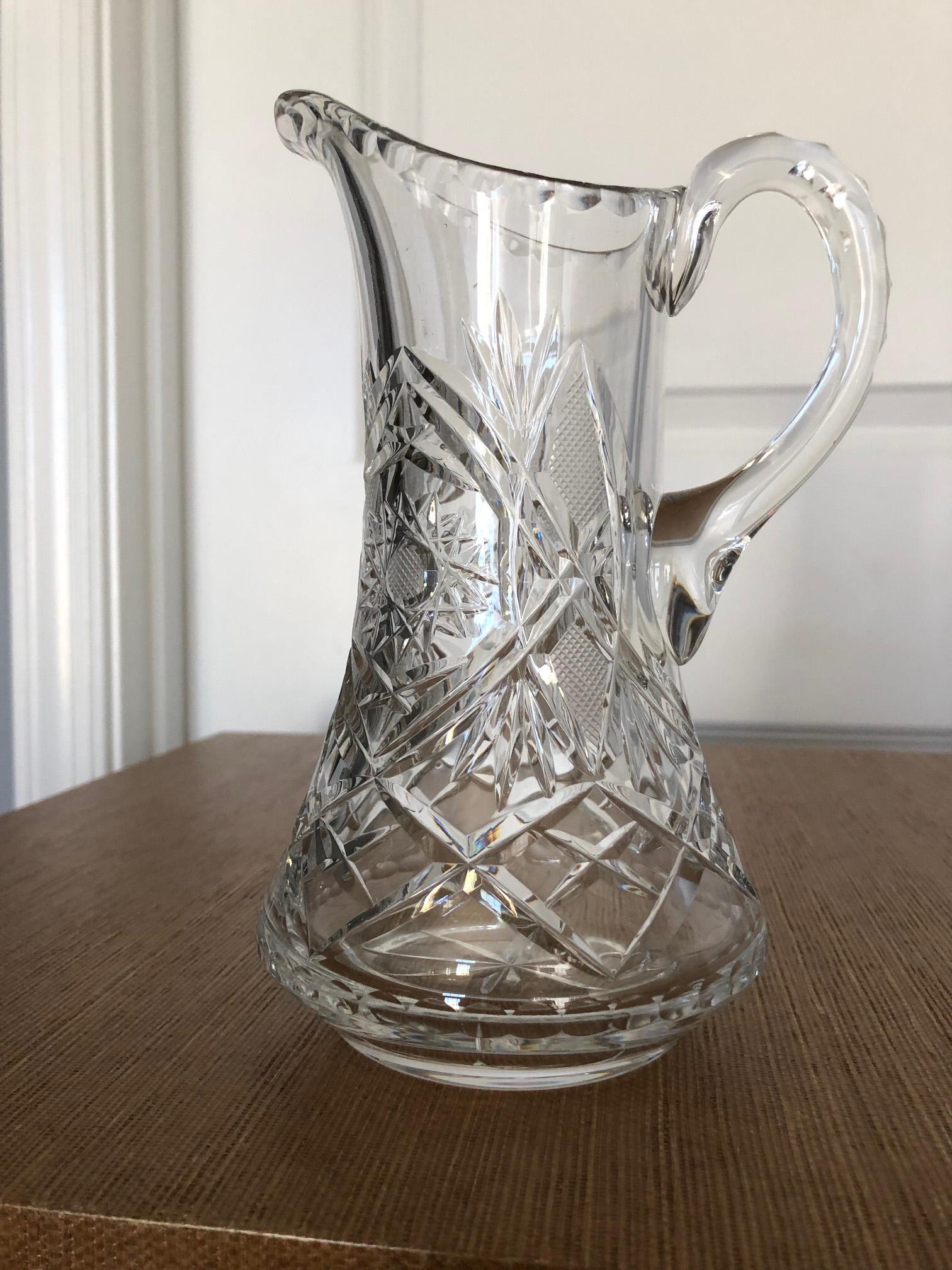 American Brilliant cut glass pitcher, maker and pattern unknown.