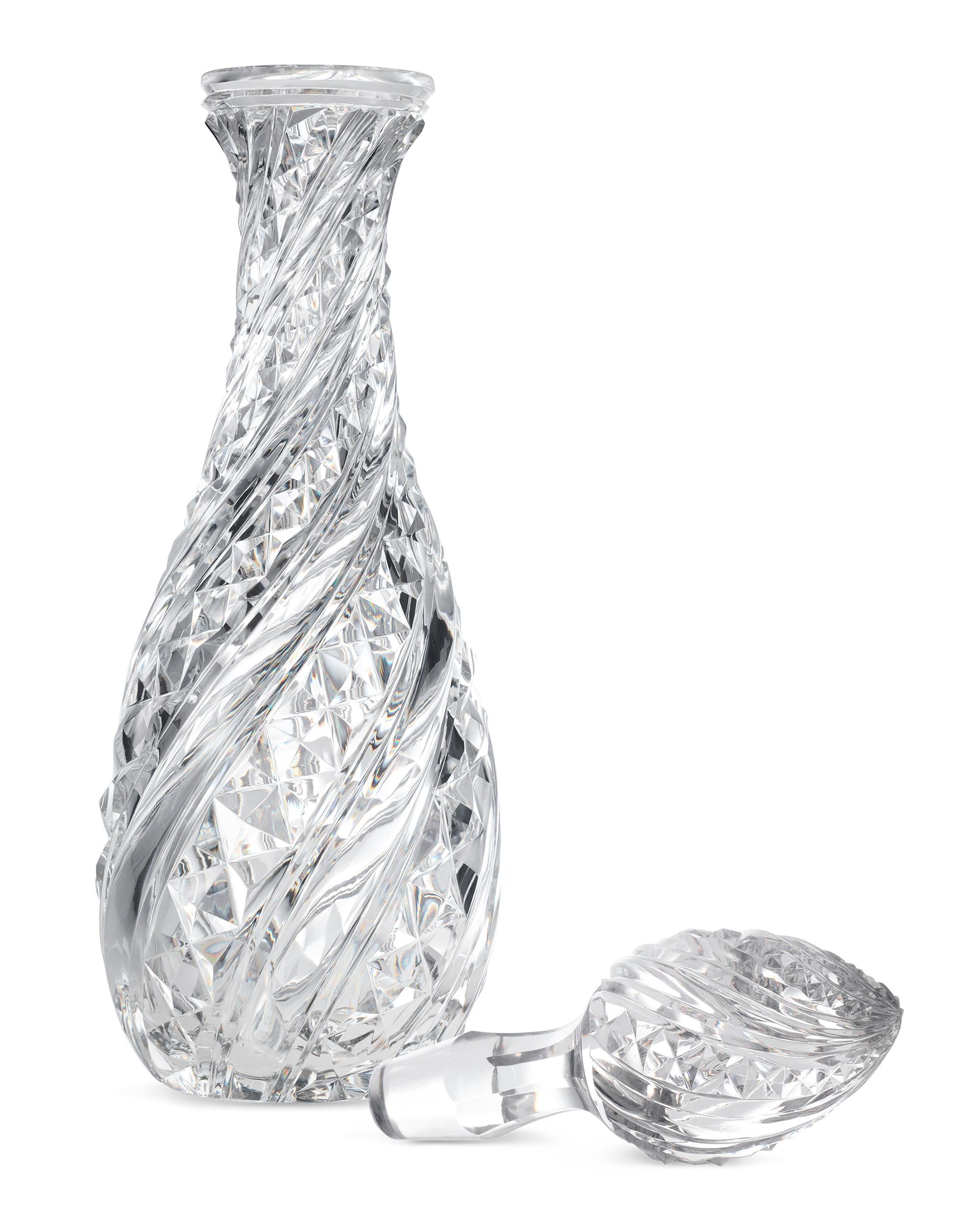 This monumental American Brilliant Period cut glass decanter is remarkable in each and every detail. Its deeply cut squares alternate between panels of clear, spiraling glass, similar to the Russian and Swirled Pillar pattern. This motif highlights
