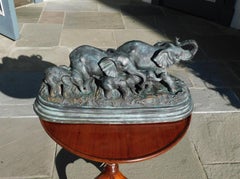 American Bronze Oval Elephant Herd Sculpture on Molded Edge Base , 20th Cent
