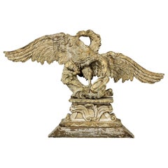American Carving of a Winged Bird and a Serpent