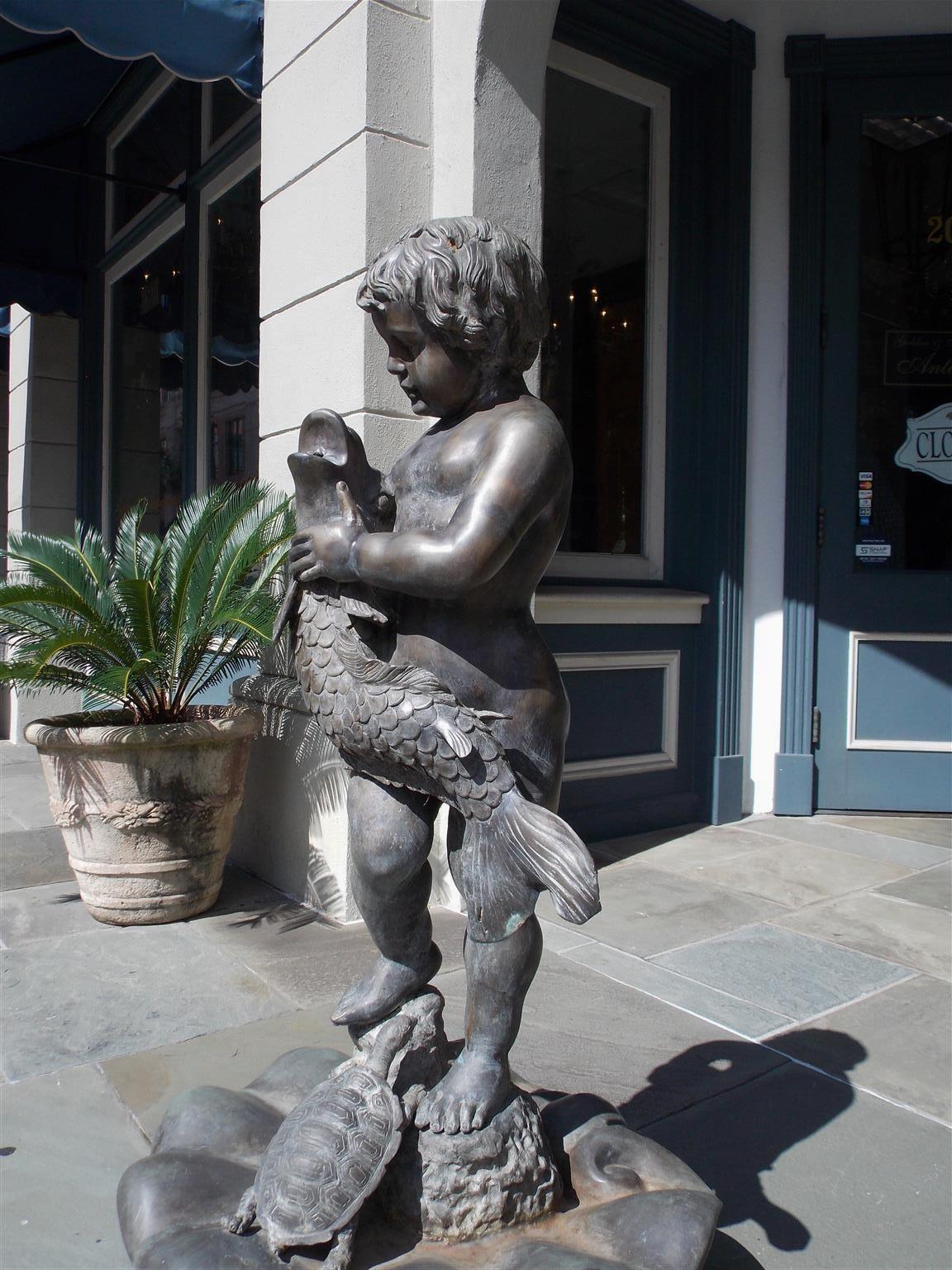 Late 19th Century American Cast Bronze Garden Fountain with Figural Boy Holding Dolphin. C. 1870