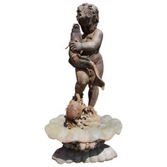 American Cast Bronze Garden Fountain with Figural Boy Holding Koi Fish. C. 1870