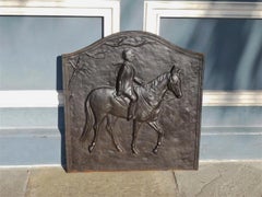 American Cast Iron Fireback with Gentleman Riding on Horse, 20th Cent. Virginia