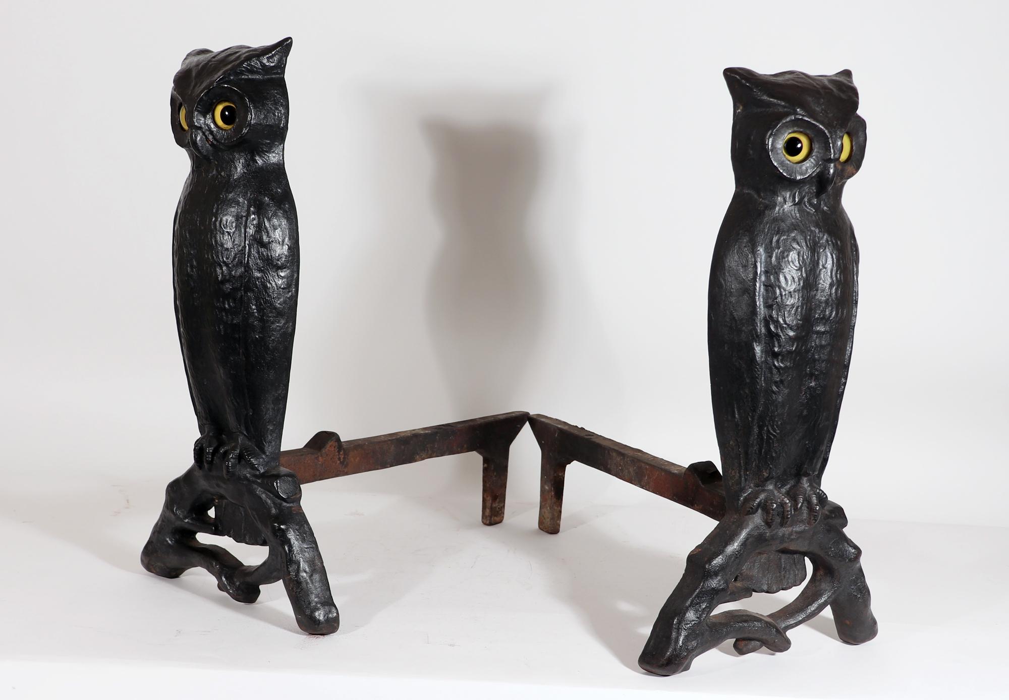 antique owl andirons with glass eyes