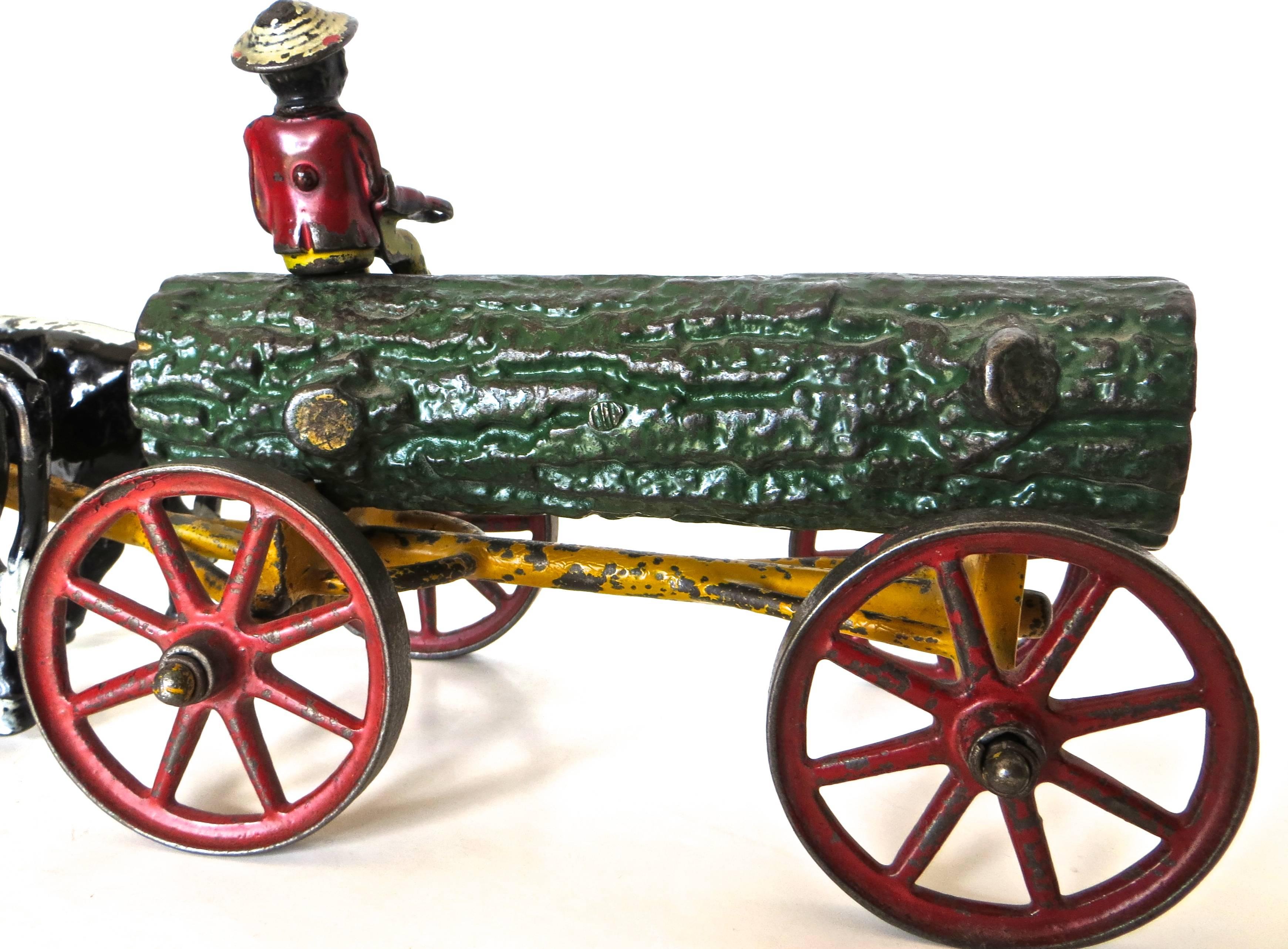 Jouet américain en fonte:: bûche tirée par un bœuf sur un chariot avec cavalier par Hubley Excellent état à Incline Village, NV