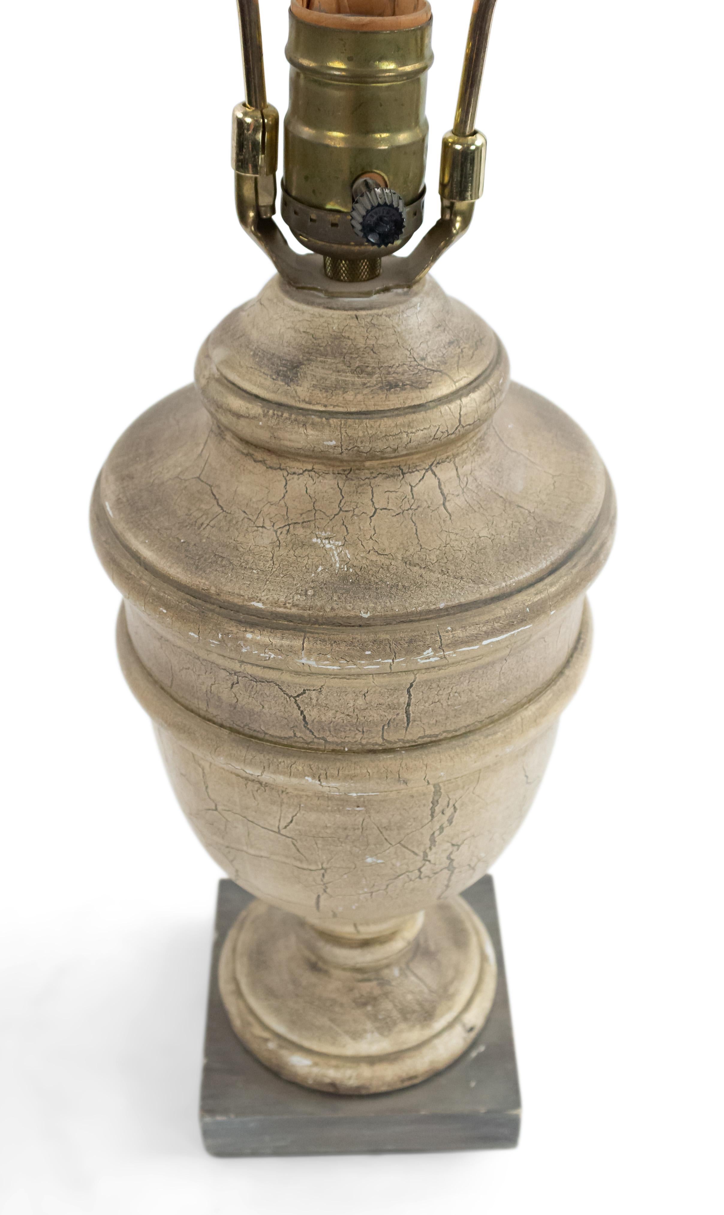 American country-style cerused wood finial mounted as a table lamp on a square base.
 
