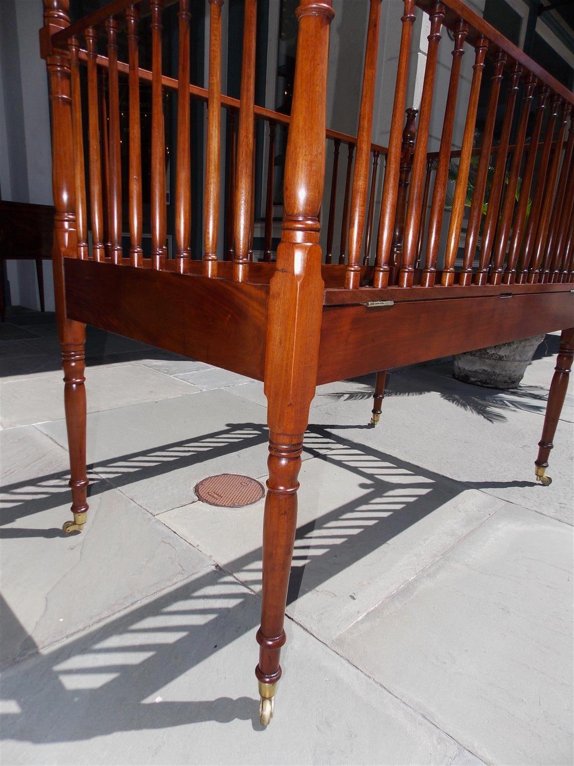 Brass American Charleston Mahogany Child's Crib with Bulbous Spindles on Casters, 1800 For Sale