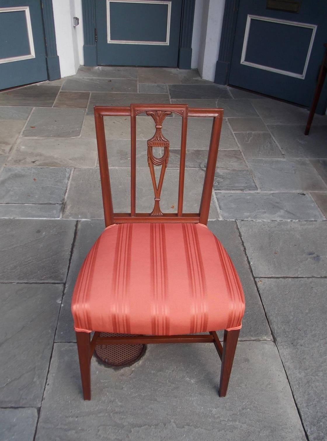 American Charleston mahogany side chair with carved molded edges, flanking fan corners, centered splat back with Prince of Wales plumes, swags, and terminating on the original tapered squared legs with connecting stretchers, Late 18th