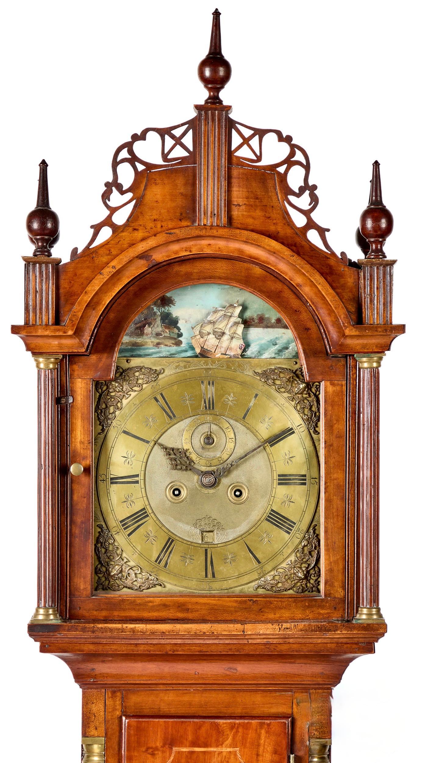 Connecticut Federal cherry tall case clock, ca. 1800, the fretwork bonnet enclosing an eight day English works with rocking ship, the face inscribed Chr. Gould Londini fecit, over a case with fluted quarter columns and sun inlaid base, 91