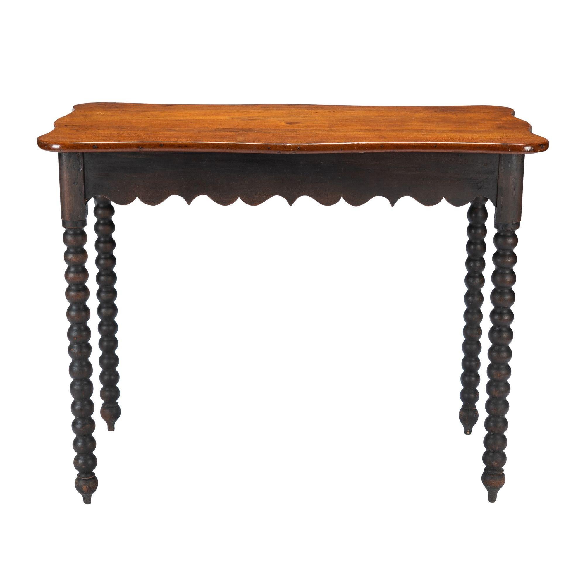 19th Century American cherry wood work table with scalloped apron and spool turned legs, 1835