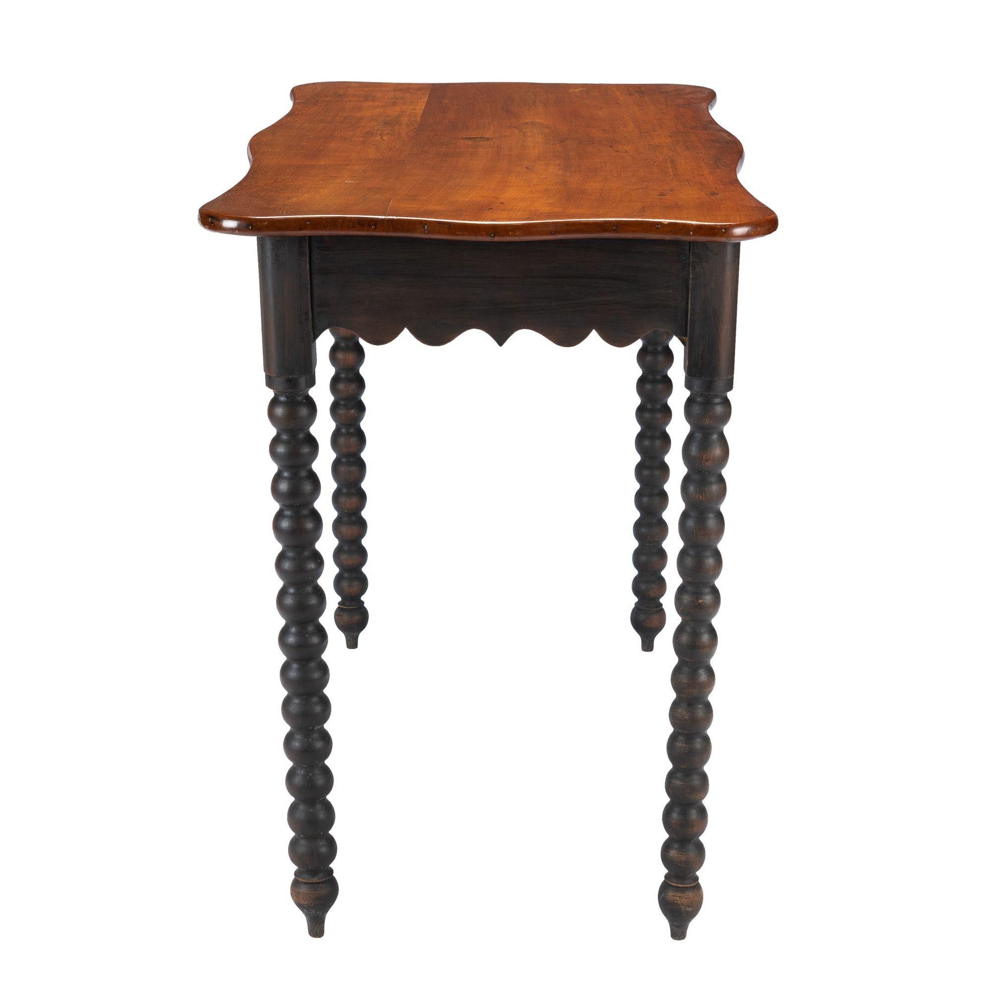 American cherry wood work table with scalloped apron and spool turned legs, 1835 1