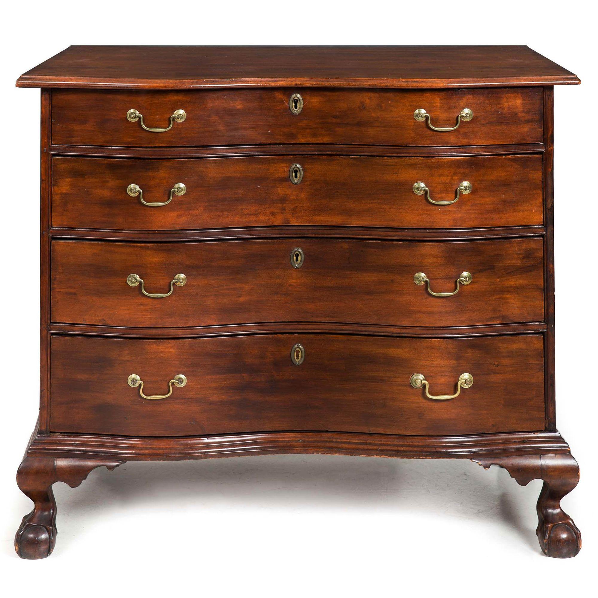CHIPPENDALE MAHOGANIZED-BIRCHWOOD REVERSE SERPENTINE CHEST OF DRAWERS
Massachusetts, probably Boston  circa 1780  retaining original brasses and resting over ball-and-claw feet
Item # 209JSW16Z 

A very fine reverse-serpentine (also known as