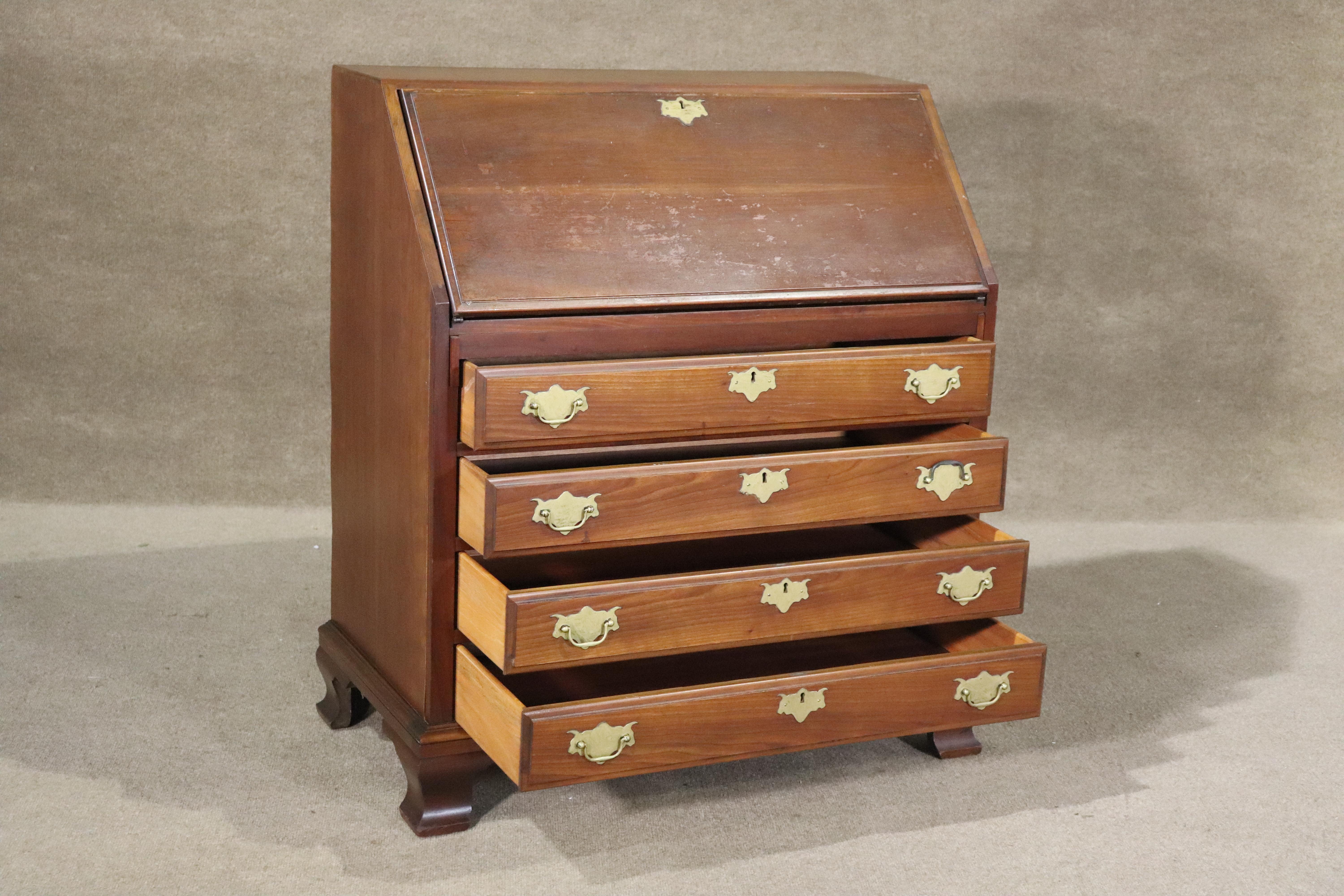 old secretary desk with hidden compartments