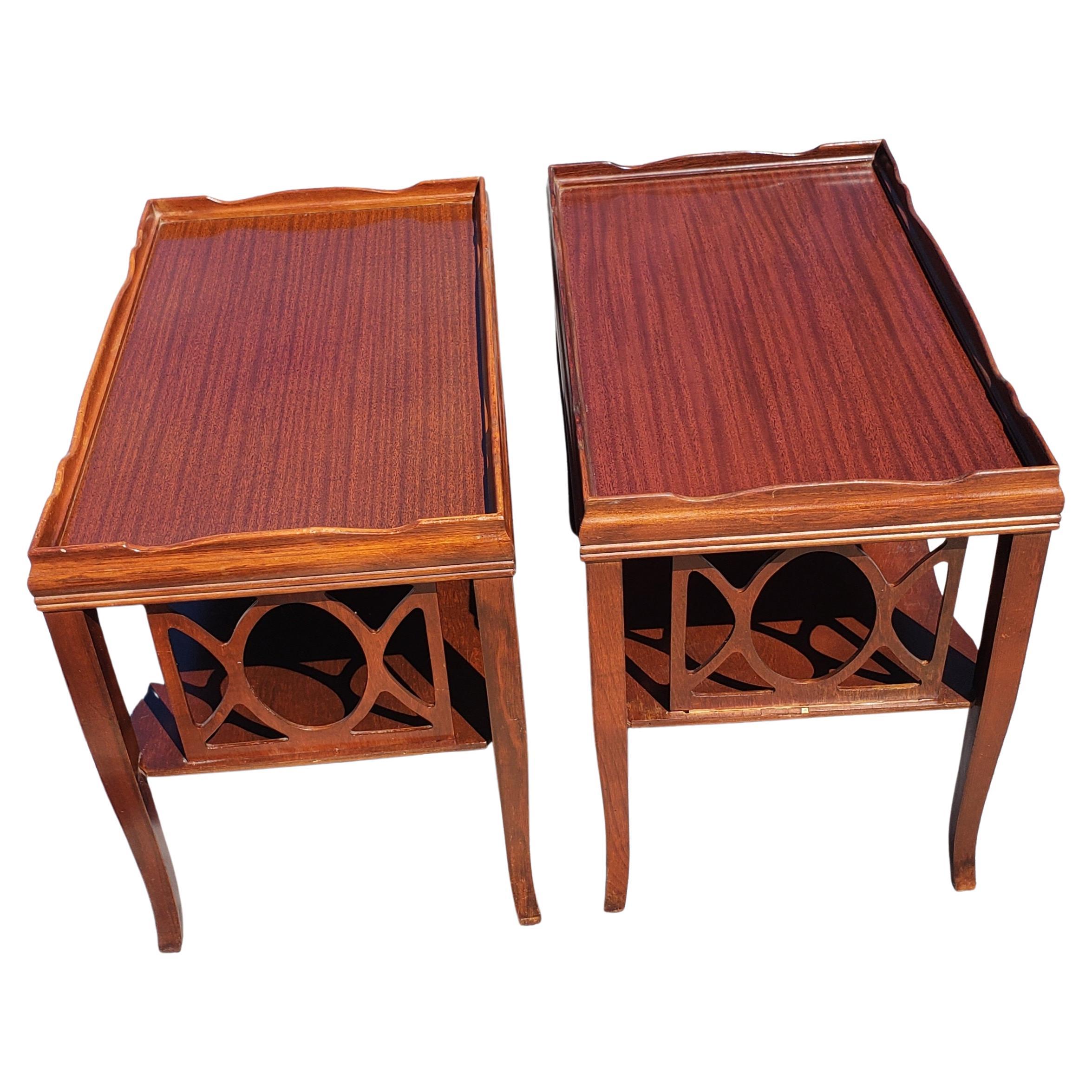 Beautiful pair of American Chippendale Tier Side Tables, Circa 1940s. Good vintage condition. 
Top in pristine condition as original owner had protective glass top that are not available now. 
Some scratches and minor losses on bottom shelves and