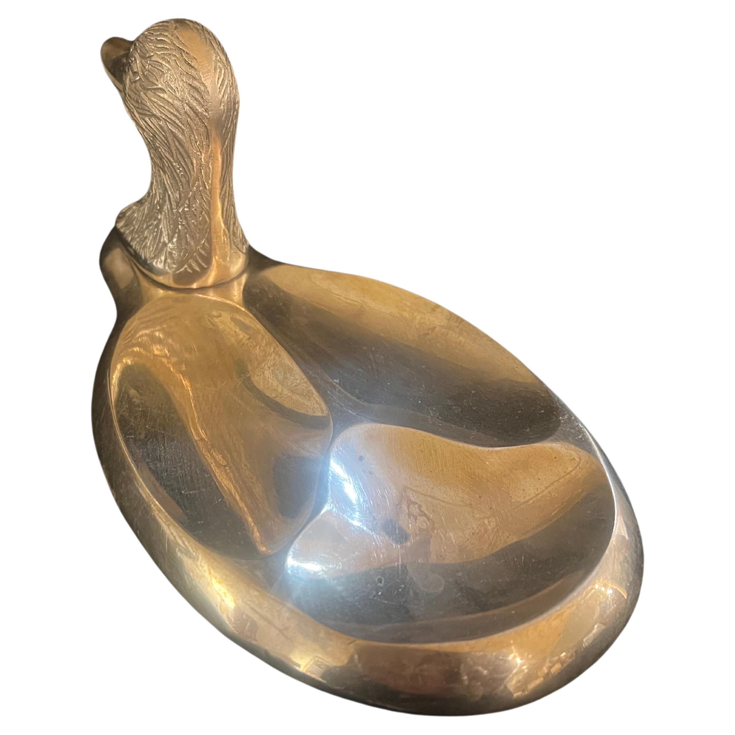 Beautiful and rare collectible solid polished brass, duck catch it all.