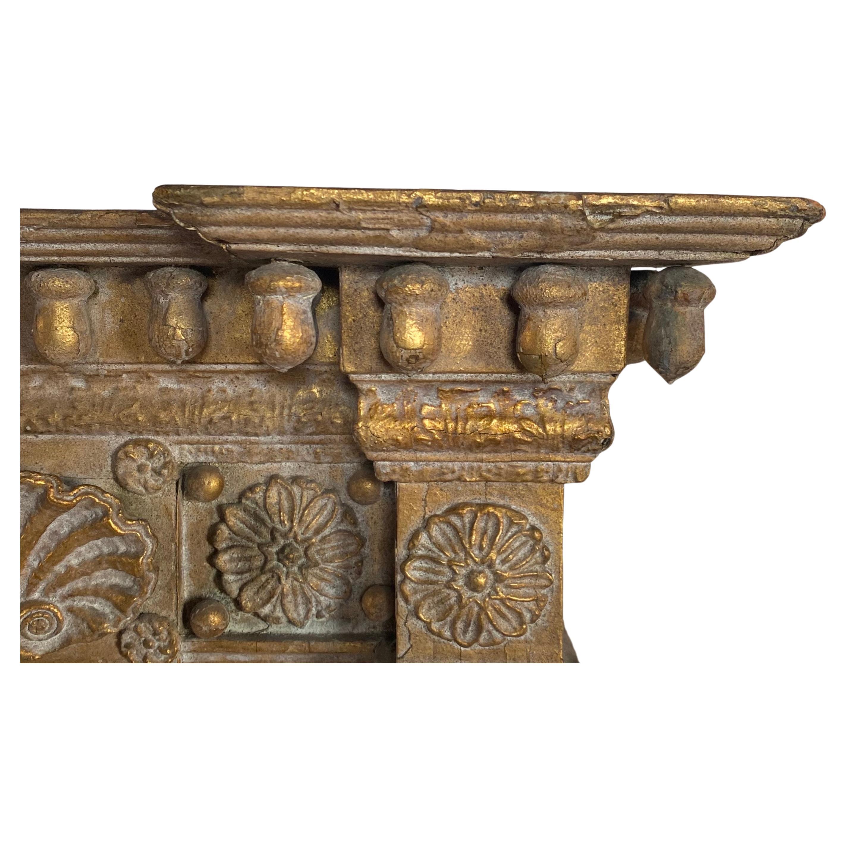 Stunning Antique American Classical gilt carved wood empire mirror, Early 19th C.  This tall detailed wall pier mirror features decorative carved acorns, a shell frieze, flanking twisted rope column motifs, and a dimensional stepped pediment. 