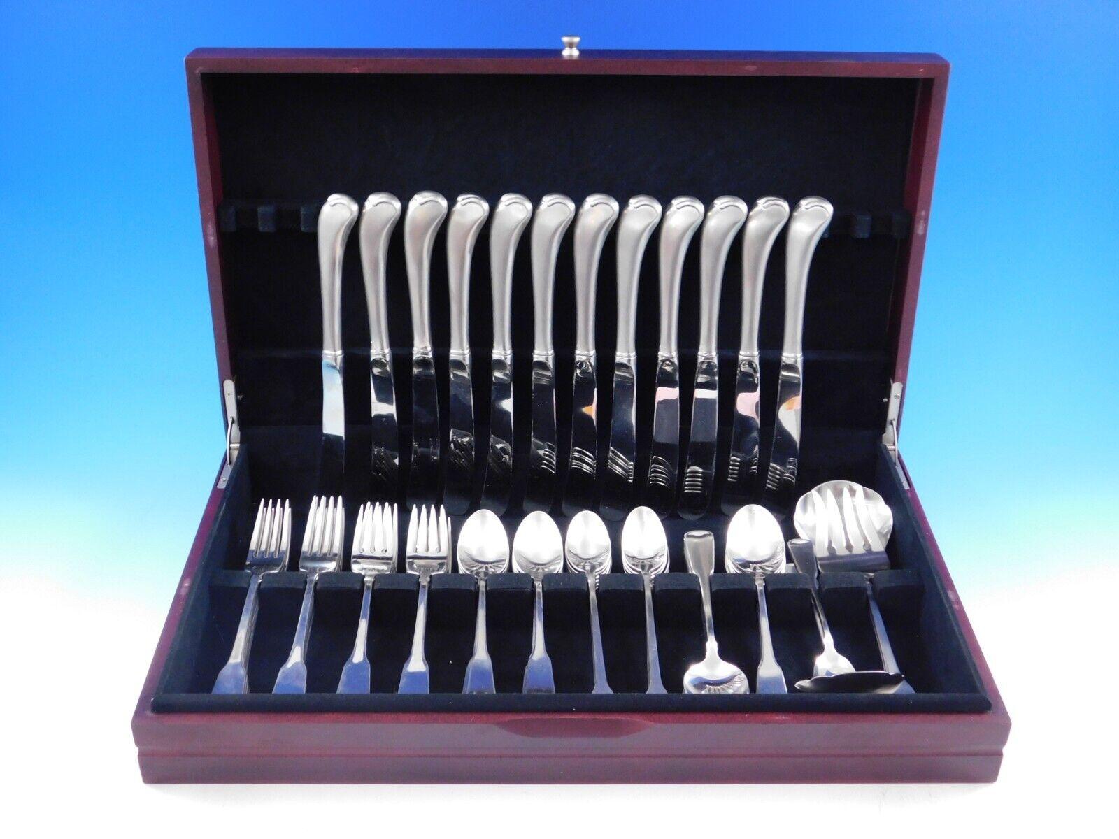 Set de couverts en acier inoxydable American Coloni by Oneida - 76 pièces, comme neuf. Cet ensemble comprend :

12 Couteaux, 9 1/8