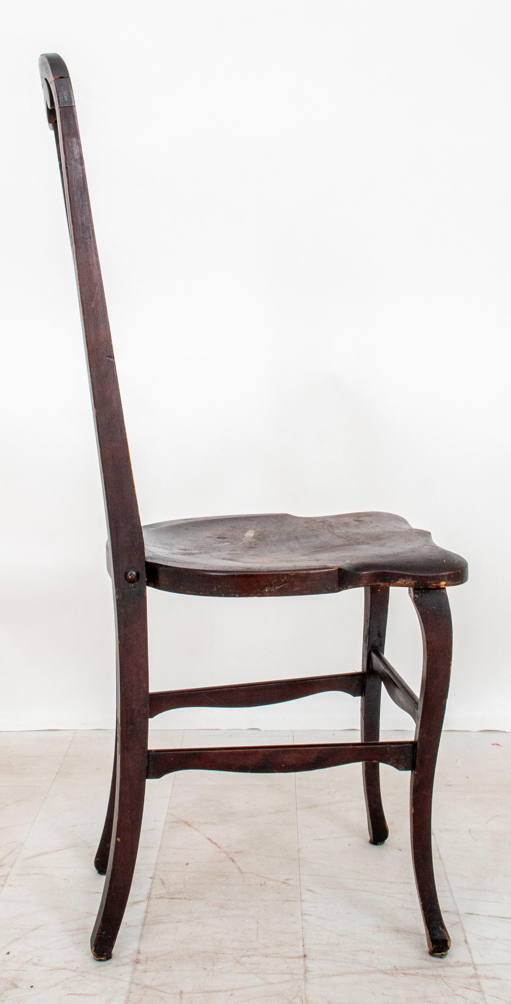  Antique American Colonial Revival wooden side or hall chair, dating back to circa 1900. Here are the specifications:

Style: American Colonial Revival
Construction Material: Wooden
Features:
Elongated vasiform backs
Shaped curvilinear seat
Four